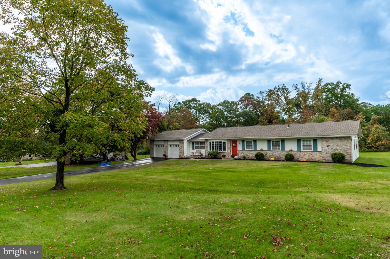 This beautifully maintained Rancher will exceed your expectations. The home features a pleasant and comfortable open floor plan along with many recent updates. Recent updates include a lovely New Kitchen, New Roof (with all new 3/4" plywood decking), and New Heat/AC. Other recent improvements include beautifully Refinished Hardwood Flooring, Re-Surfaced Patio and Re-Surfaced-Finished Basement floor. Total above grade finished sq. ft. 2,101. Total below grade finished sq. ft. 916 for a total of 3,017 sq. ft. of living space. Improvements made over the years include, converting Breezeway to a Family Rm., added 1st Fl. Laundry Rm./Pantry addition, Extended Bedrooms (1 & 2) with 8ft bump out, added Mud Room entry from Garage, Finished Basement, added Water Softener and Reverse Osmosis drinking water system. Other features include Extra deep 2-car Garage with work bench and storage cabinets, 1 acre level lot backing to tree line, quiet low traffic street in close proximity to Perkiomen Valley Elementary, Middle, and High School. This home has been gently lived in and lovingly cared for over the past 29yrs by the current owner. Seller is a licensed PA RE agent.