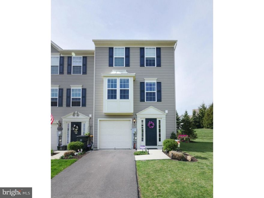 Absolutely stunning, designer-inspired, 3 bedroom end-unit townhouse in the desirable Parkland School District! This bright and sunny, impeccably maintained home shows just like a model. It boasts 3 full floors of finished living space. As you enter into the foyer, you will be greeted by tasteful, neutral colors which continue into the walk out family room. The garage and powder room are also on this level. As you enter the 2nd floor, you will appreciate the spacious living room and the gorgeous eat-in kitchen which boasts upgraded cabinets, newly installed lighting and center island; sliding glass doors lead to a 20x10 ft freshly stained deck perfect for entertaining and outdoor dining. The master bedroom with a spacious walk-in closet; 2 more bedrooms and a full bath complete the top floor. Close proximity to beautiful parks, farmer's markets, numerous shops and local attractions. Low taxes and USDA eligible!