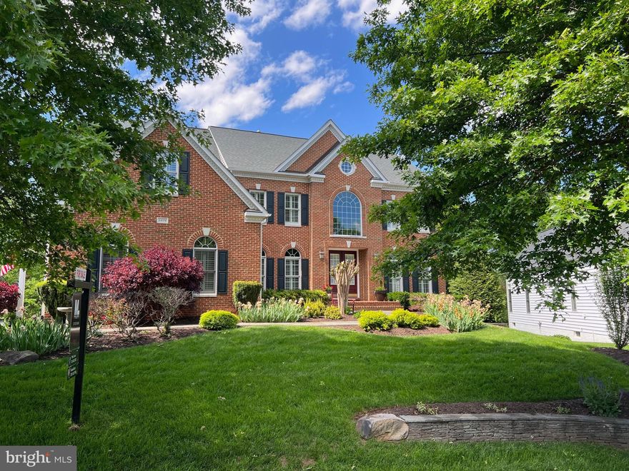 Set atop a picturesque 0.61-acre lot in the prestigious Lenah Run community, this exceptional 6,200-square-foot estate offers a rare blend of timeless elegance and inviting warmth. 
Upon entry, soaring ceilings and a dramatic two-story family room make a striking first impression. Imagine hosting intimate, or grand and lively, gatherings in the formal living and dining spaces that are made for entertaining. A private library with custom built-ins offers a peaceful and quiet retreat. Enhancements such as plantation shutters throughout, integrated sound, and whole-home connectivity seamlessly elevate the home. 
Step into the gourmet kitchen, with new stainless-steel appliances, a huge kitchen island and large breakfast area. The expansive, and partially covered deck overlooks a spectacular 20' X 40' saltwater pool and fenced backyard, complete with a serene, wooded backdrop. 
Upstairs, the luxurious primary suite serves as a true sanctuary, featuring a spa-inspired bath and an expansive walk-in closet with heated floors. Two secondary bedrooms share a Jack-and-Jill bath, while an additional bedroom and full bath provide comfort and flexibility for family or guests.
The fully finished walkout basement is designed for entertaining, featuring a custom bar, recreation room, and media room, ideal for movie nights and gatherings.  Nestled in a quiet neighborhood known for its friendly community and tranquil setting, this home is ideally located near shopping and dining, with convenient access to Route 50, Route 15, Dulles Airport, Leesburg, Middleburg, and Chantilly. 
This is more than just a house—it’s a place to live fully, entertain effortlessly, unwind comfortably, and truly feel at home.