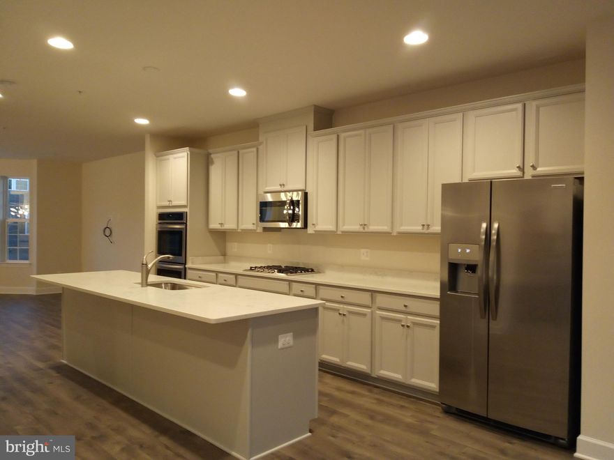 A BRAND NEW HOME.  LIVE THE LIFE OF YOUR DREAMS TOMORROW.  The opportunity doesn't come often to experience a "NOT RENOVATED" but a brand new home without buying.  9 foot ceilings.  Laundry on top level.  Top of line security camera and systems installed.  Relax in this new development.  Be the first!!!