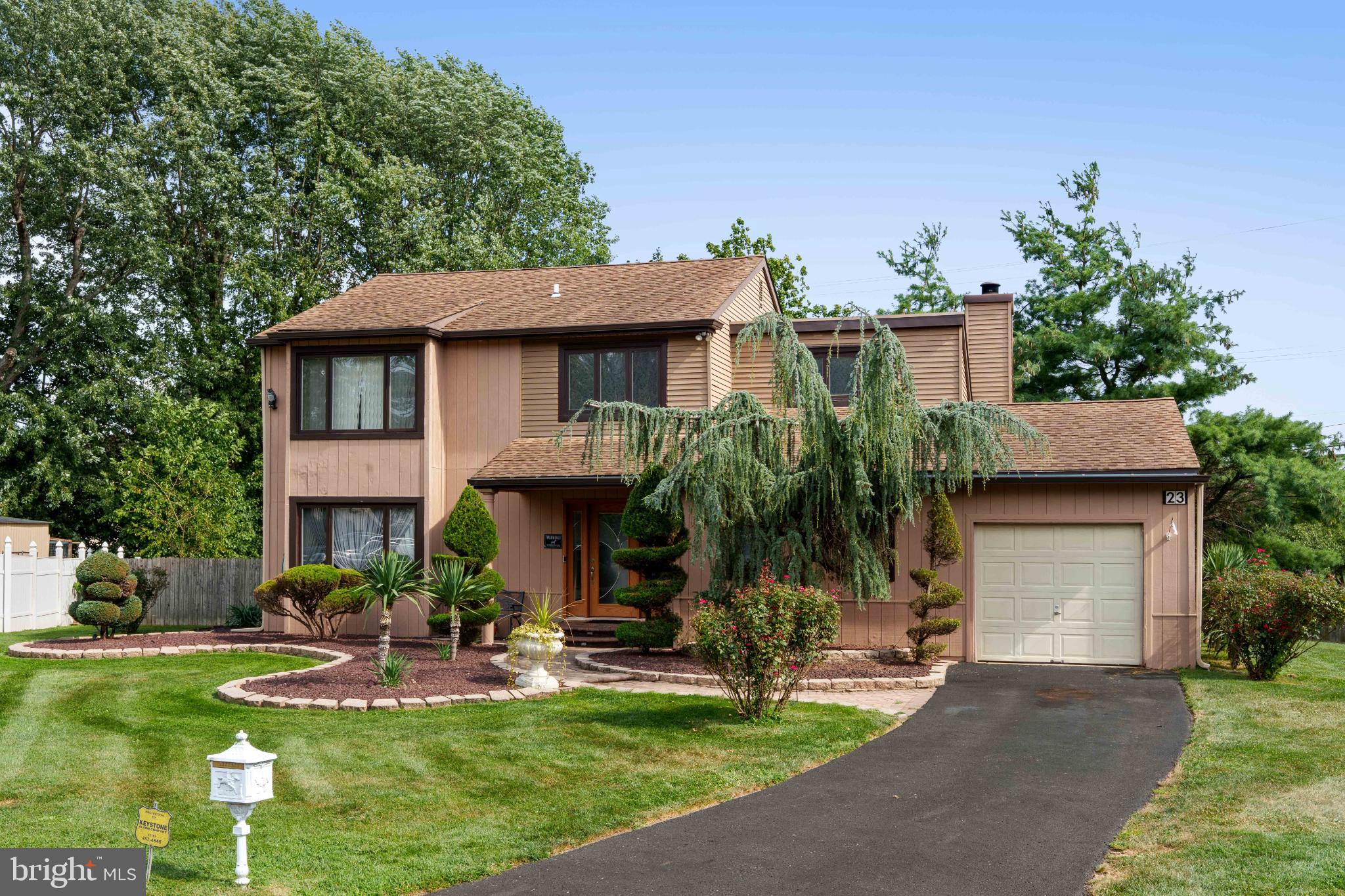 Tucked away on a quiet cul-de-sac in the desirable Tapestry community, this move-in-ready Colonial offers space, style, and a hands-off lifestyle thanks to the low-maintenance HOA. A two-story foyer opens to sunlit living and dining rooms with hardwood floors, leading to an updated kitchen with cherry cabinets, granite counters, stainless steel appliances, and a breakfast area overlooking the vaulted family room with wood-burning fireplace. Step outside through French doors to your private backyard oasis with a patio, mature landscaping, and play area—perfect for gatherings or quiet mornings. Upstairs, three spacious bedrooms include a primary suite with stall shower, while the finished basement provides extra room for work, play, or fitness. Enjoy the comfort of a one-car garage, two-car driveway, main-floor laundry, and tasteful updates throughout. All just minutes from shopping, dining, parks, and commuter routes, with top-rated Council Rock schools.