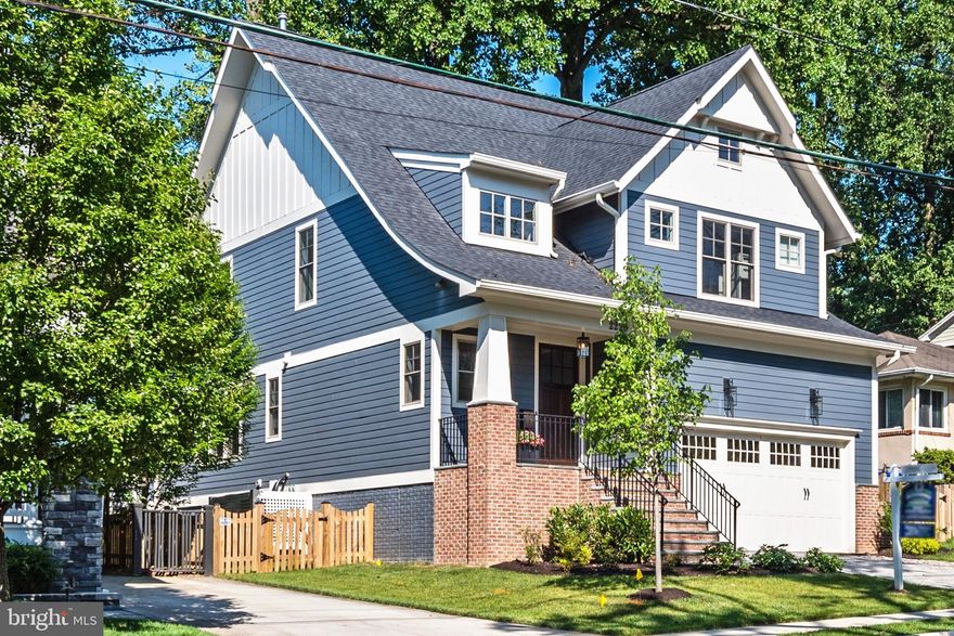 ********Owner loves this one year old home but has been transferred from area, leaving this wonderful Springstreet Development home to the next buyer**             Walk to Westover Village, Lee-Harrison Center, parks, and bike trail from nearly new Craftsman home in the Nottingham, Swanson, Yorktown district.**Distinctive details include wood floors on two levels, extensive wainscoting and moldings, abundant Andersen Low E windows with custom window treatments,  2 zone heating and cooling, Kohler bathroom fixtures, consumer friendly KitchenAid appliances, and daylight walk out lower level***Main level den with full bath doubles as occasional guest room.  Chef worthy kitchen with quartz countertops, center island, glass tile backsplash, 6 burner gas range plus separate wall oven.  Butler's pantry with wine fridge off traditional dining room. Coffered ceiling and gas fireplace in family room.*** Atrium doors to back yard with mature trees and shrubs.  Kitchen, breakfast area, and family room span back of home and offer something pretty to see from each of the large windows.** Upstairs, the master suite has triple windows overlooking the yard, tray ceiling, two walk-in closets with organizers, and a spa style bath with separate soaking tub, large shower, double bowl vanity, and separate WC.***  The second upstairs bedroom has both a walk in closet with organizers and an en suite bathroom.  The third and fourth bedrooms share a bath with double bowl vanity and separate tub and toilet area.  The laundry room is also on this level.***The lower level offers an expansive rec room with areas for media, play, sports, and hobbies.  French doors open to a gym (or second office) with rubberized flooring.  The fifth bedroom and bathroom are on this level along with additional storage.** A prinstine home awaits the savvy buyer.