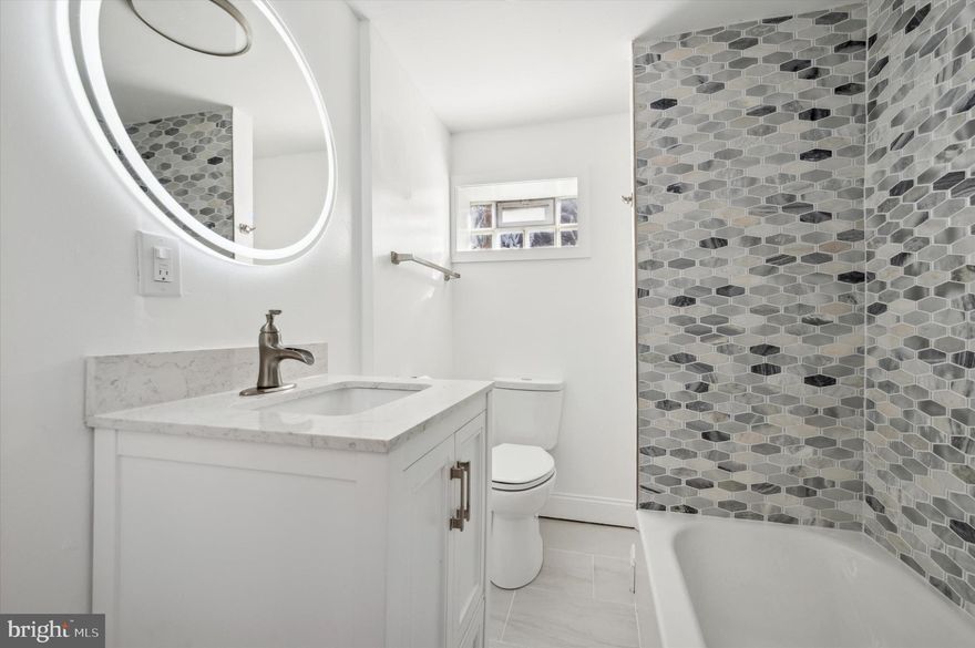 Welcome to 2732 W York St, a beautifully renovated home in the heart of Philadelphia, offering a quick commute to cultural and business hubs, public transportation, and Center City. This stylish two-story property boasts a fresh, modern look with meticulous upgrades throughout. The exterior is freshly painted with a sleek, contemporary color, offering excellent curb appeal.

Step inside to find a spacious, open-concept living area flooded with natural light, featuring elegant recessed lighting, chic light fixtures, and beautiful hardwood flooring that flows seamlessly into the dining area. The accent wall with stone veneer adds a unique character to the space, creating a cozy atmosphere perfect for entertaining.

The kitchen is equipped with stainless steel appliances, modern cabinetry, and a striking tile backsplash. With ample counter space and storage, this kitchen makes meal prep a breeze.

Upstairs, the bedrooms are generously sized, featuring new floors and plenty of closet space. The updated bathroom shines with a stylish tile design and a backlit mirror, adding a touch of luxury to your morning routine.

Enjoy outdoor gatherings in the private, fenced backyard – perfect for relaxing in the sun.

Ideally located with easy access to public transportation and a variety of cultural and business hubs, this home offers convenience for both commuting and exploring all that Philadelphia has to offer. Don’t miss the opportunity to make 2732 W York St your new home—schedule a showing today!