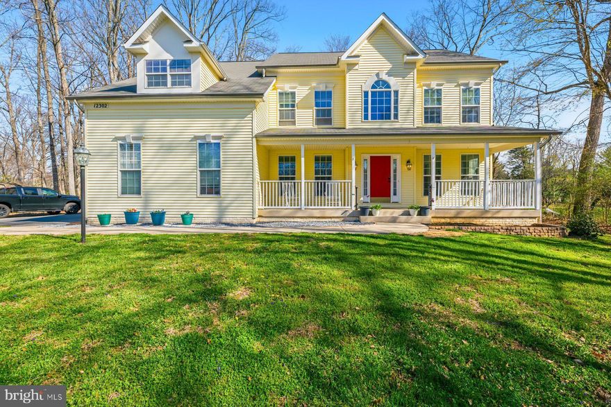 Welcome to 12302 Hungerford Manor Drive. 5,384 sq. ft. of living space nestled on 1.33 private acres in Monrovia. This 4-bedroom, 4 full bath, 1 half bath home spans three finished levels with new roof installation in April 2026. The main level features a dedicated home office, formal living room, formal dining room, and a family room with a fireplace, all flowing into a spacious eat-in kitchen. LVP flooring and carpet run throughout the home. Upstairs you will find four bedrooms, including an oversized primary suite with a generous bath. The finished walk-up basement offers a wet/dry bar and two bonus rooms ideal for a home gym, media room, or additional flex space. Enjoy the front porch and back deck overlooking a peaceful, private lot. The home is on well water with no monthly water bill, features an owned 1,000-gallon propane tank, dual-zone HVAC, and an active radon mitigation system already in place. Video tour available