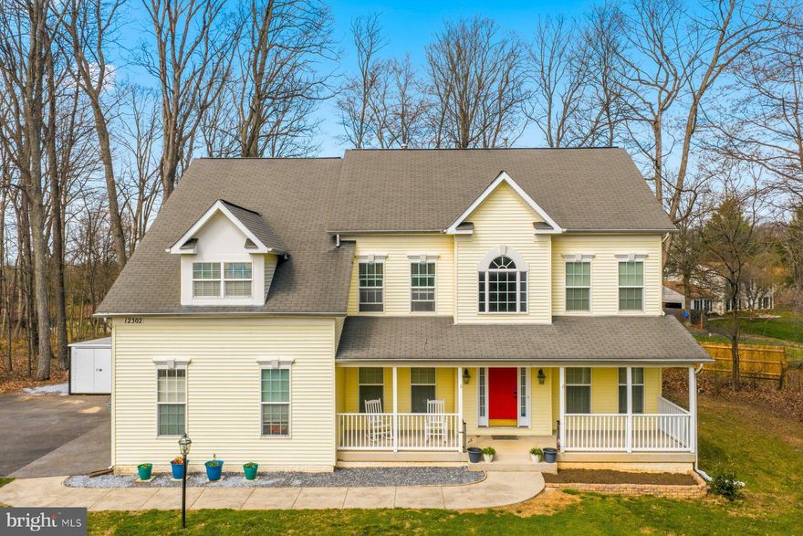 Coming Soon! MORE PICTURES TO COME!

Welcome to 12302 Hungerford Manor Drive. 5,384 sq. ft. of living space nestled on 1.33 private acres in Monrovia. This 4-bedroom, 4 full bath, 1 half bath home spans three finished levels with new roof installation in April 2026. The main level features a dedicated home office, formal living room, formal dining room, and a family room with a fireplace, all flowing into a spacious eat-in kitchen. LVP flooring and carpet run throughout the home. Upstairs you will find four bedrooms, including an oversized primary suite with a generous bath. The finished walk-up basement offers a wet/dry bar and two bonus rooms ideal for a home gym, media room, or additional flex space. Enjoy the front porch and back deck overlooking a peaceful, private lot. The home is on well water with no monthly water bill, features an owned 1,000-gallon propane tank, dual-zone HVAC, and an active radon mitigation system already in place.