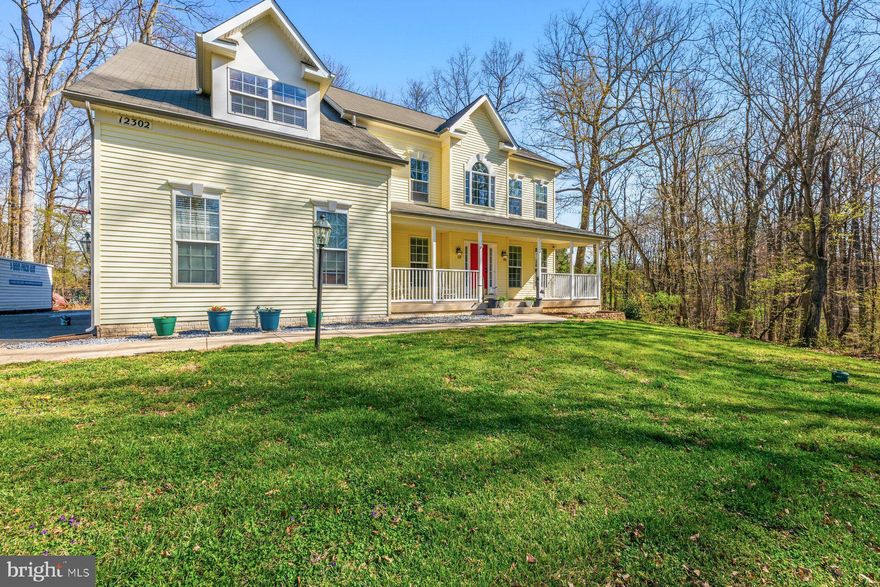 Welcome to 12302 Hungerford Manor Drive. 5,384 sq. ft. of living space nestled on 1.33 private acres in Monrovia. This 4-bedroom, 4 full bath, 1 half bath home spans three finished levels with new roof installation in April 2026. The main level features a dedicated home office, formal living room, formal dining room, and a family room with a fireplace, all flowing into a spacious eat-in kitchen. LVP flooring and carpet run throughout the home. Upstairs you will find four bedrooms, including an oversized primary suite with a generous bath. The finished walk-up basement offers a wet/dry bar and two bonus rooms ideal for a home gym, media room, or additional flex space, or possible 5th “bedroom”. Enjoy the front porch and back deck overlooking a peaceful, private lot. The home is on well water with no monthly water bill, features an owned 1,000-gallon propane tank, dual-zone HVAC, and an active radon mitigation system already in place. 

Video tour available