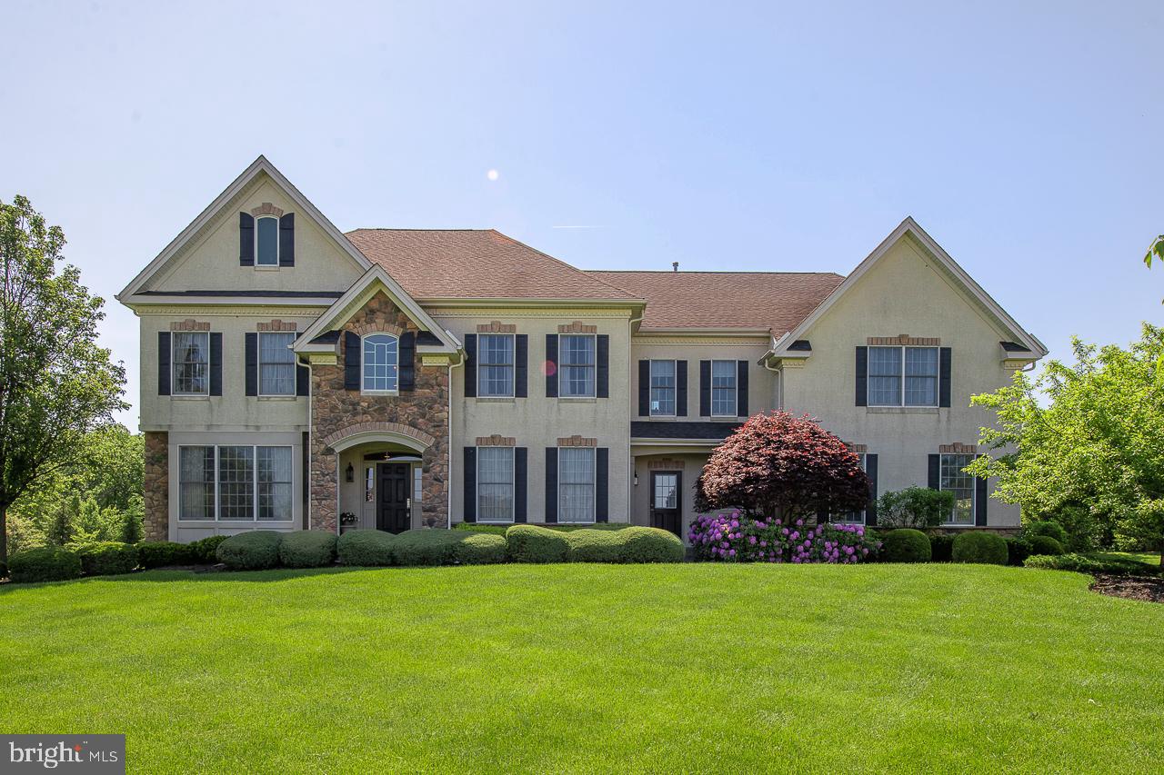Foxhall Estates is a premier community located on a private cul-de-sac in beautiful Bucks County. This impeccable property has bells and whistles combined with gracious living plus it is located at the end of the cul-de-sac! Built by Orleans Builders, this is the sought after Bellingham model with a very open and unique floorplan. With over 6500 SF of comfortable living, this 5 bedroom, 4.5 bath Estate home offers lots of natural light, attention to detail, large private lot, and a custom lower level. Main level offers 2 story open grand foyer anchored by formal living room and dining room, home office with built-in’s enclosed by glass French doors, 2 story family room centered by a gas fireplace and oversized picturesque windows bringing the outdoors in. Adjacent to the family room is the spacious eat-in gourmet chef’s kitchen with Granite Island, high end appliances, beautiful cabinetry, custom dessert pantry and another spacious kitchen pantry. Access to 3 car garage, powder room, main level laundry. Hardwood floors throughout and in pristine condition. Second level offers a luxurious Master bedroom suite with his/her walk in closets, Jacuzzi, glass enclosed shower and incredible outdoor views from oversized windows. Four additional family sized bedrooms with 2 additional baths and lots of abundant closets and storage space complete this level. Walk-out Lower level is a huge WOW! Renovated in 2011, you will find a Custom home theatre, custom cedar closets, custom bar, and amazing yoga/gym area, full bath, and so on…this is an entertainment space like no other and will seal the deal. This meticulous home offers 2 zone heating/cooling, surround sound system throughout and a huge backyard to continue to entertain, install the pool of your dreams or whatever your heart desires. Close to Newtown borough's great restaurants, shops, theatre and parks. Located to all major highways, and the rail system, which makes commuting to Philadelphia, Princeton, NJ and New York City a breeze..