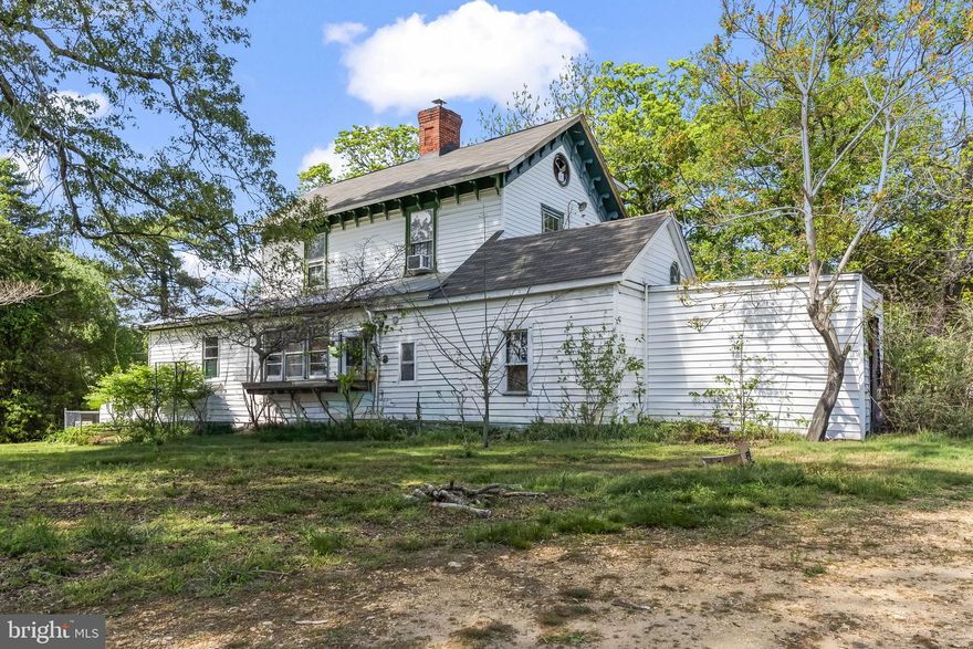 Investor/Rehabber Alert! 2000 SQ FT Colonial with 6 Stall Horse Barn in need of total renovation. This property offers a rare opportunity to restore and reimagine a classic Colonial set on a level homesite with a circular driveway, fenced yard, and equestrian-ready acreage. With its expansive footprint and timeless character, this is an ideal project for buyers looking to create value and bring new life to a unique country estate. A large covered front porch welcomes you into a traditional layout featuring a foyer with high ceilings, a spacious living room with a wood-burning fireplace, and a formal dining room designed for gatherings. The kitchen includes a pantry area and connects to the main living spaces, while a private office off the dining room provides flexibility for work or hobbies. A main-level full bath and laundry room add convenience, along with access to the root cellar for additional storage. Upstairs offers three bedrooms and one full bath, with additional stairs from one bedroom leading to a third-level fourth bedroom. Original fireplaces remain as architectural features, with one currently functional. The exterior and land set this property apart. Designed for equestrian use, there are two fenced paddock areas—approximately 1.5 acres and a larger secondary section approximately 2 acres—along with a substantial six-stall horse barn featuring water, electric, a tack room, and a finished attic area for hay storage. An additional structure, formerly the Durham Church hall, provides extra space but appears to require removal or complete renovation. The in-ground pool is present and conveys as-is. This property is being sold strictly as-is and will require significant renovation.. For those with vision, the combination of historic charm, usable acreage, and existing equestrian infrastructure creates a compelling opportunity to build equity and transform this property into something truly special.