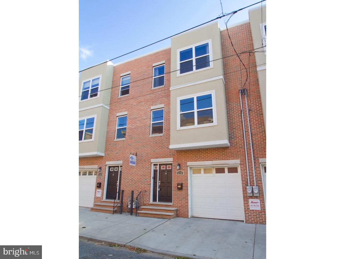 Newer construction home with garage in the Spring Arts area, right next to Northern Liberties, loaded with all the amenities on any renters shopping list! 1-car garage parking, extra-large rear yard, 20ft wide by almost 50ft deep floor plan with huge rooms, lots of space and tremendous natural light. This home has a beautiful brick fa ade, 4 bedrooms, 2.5 baths, tax abatement and much, much more! Some other amenities include wide plank hardwood floors throughout, travertine tile bathrooms, finished basement, washer and dryer included, extra-large luxurious kitchen with granite countertops, stainless steel appliance package and granite island for dining and entertaining. The master suite has a designer free standing soaking tub, huge European shower with glass wall and open entrance, floating vanity, beautiful tile work and high end fixtures. As we stated, this home has it all, you will not be disappointed. Walkable to everything!