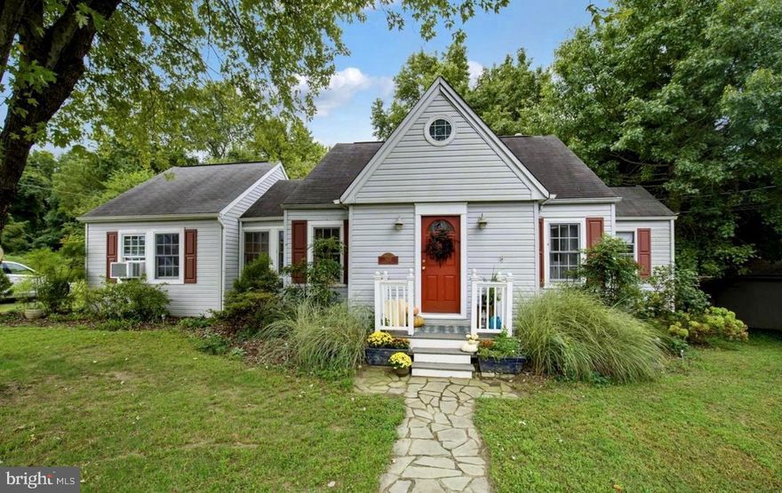 Adorable cottage style beach home with a private community beach and spacious fenced yard, backing to conservation preservation! This rarely available Shoreham beach house is just steps from the water in the fabulous community of Shoreham beach, with an amazing community beach, boat ramp and launching pier. This home offers an updated kitchen with corian counters and stainless steel appliances, 3 bedrooms and 2 full updated baths.  2 bedrooms are on the main level, and the master suite is upstairs with large windows and a skylight. Original heart of pine wood floors, pocket doors, and sunny open floor plan that is great for gatherings. Shaded entertaining deck & patio out back for relaxing with your morning coffee or afternoon cookouts. Fabulous insulated she-shed with electric that could be a workshop, art studio, or separate office. Newer roof, newer hardwoods in the master suite upstairs, newer hvac mini-split upstairs and the list goes on! Great schools , near Mayo Beach and the picnic pavilions and charming walking paths of Beverly Triton nature park.