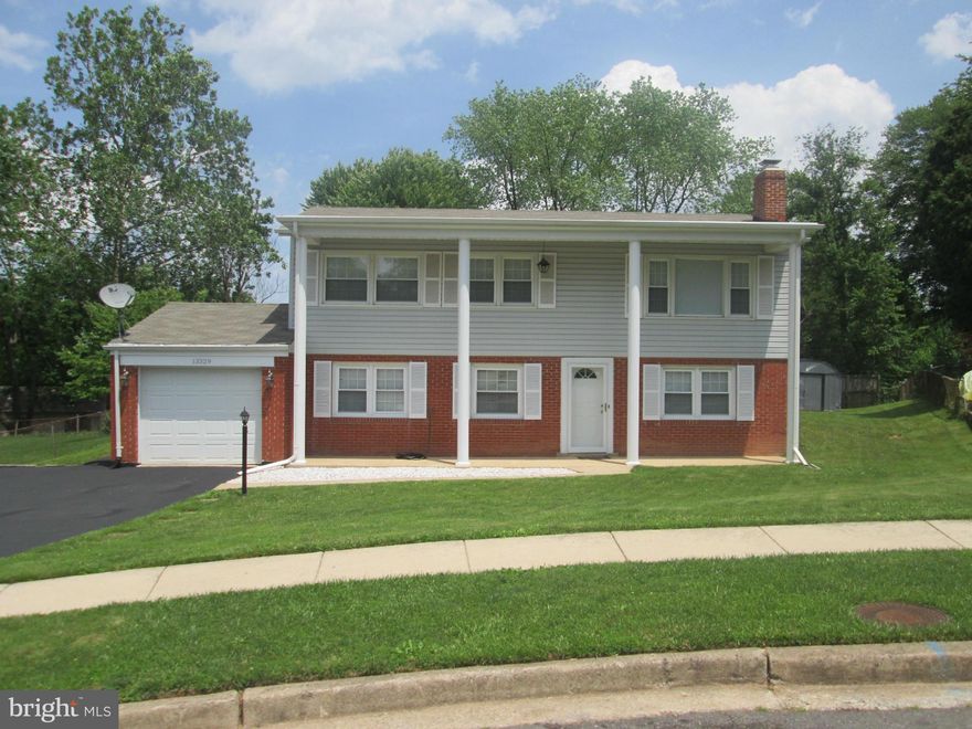 PRICE ADJUSTMENT: Beautiful Single Family - Remodeled 4BR/3Full Baths   New Kitchen w/ SS Appliances & Granite. Newly Remodeled Baths.  Hardwoods in Liv and Din.  Fireplace. 1 Car Garage /w large driveway. Pillars and covered porch.  HUGE deck says ENTERTAIN!!!  Move-in READY!  Free Hm Warranty W/Buyer using Cardinal Title. Newer roof and gutters.