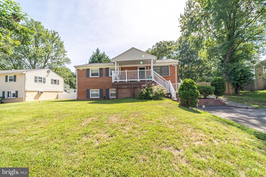 ***Delightful single-family home with a welcoming covered front porch and a huge fenced in backyard! 4 Bedrooms  2 Full Baths 1 Half Bath, Hardwood flooring throughout the main level  recessed lighting  in the living room. 3 bedrooms on the main level along with a full bathroom. The Kitchen  has access to a large deck! Eating area off the kitchen  Main level features a full bathroom with ceramic tile flooring and a shower/tub,  Fully finished lower level with a spacious recreation area  sliding glass door access to a pavers patio and looks out to the tree lined back yard.  4th bedroom on The lower level also features a full bathroom with ceramic tile flooring, single sink vanity and a shower/tub combo with tile surround. Completing the lower level is a large laundry room with utilities and additional storage space! Great Location just minutes away from a commuter lot, Veterans Park, Hammill Mill Park, Stonebridge Town Center and so much more!