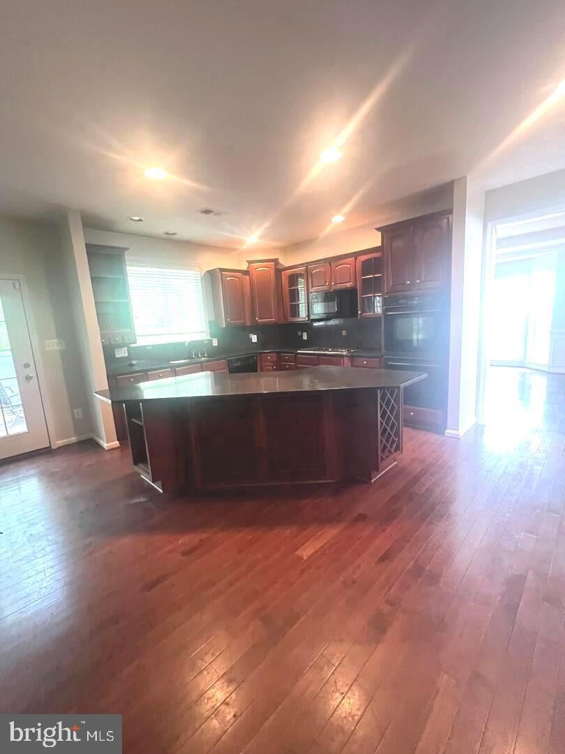 9315 RUSTIC BREEZE COURT