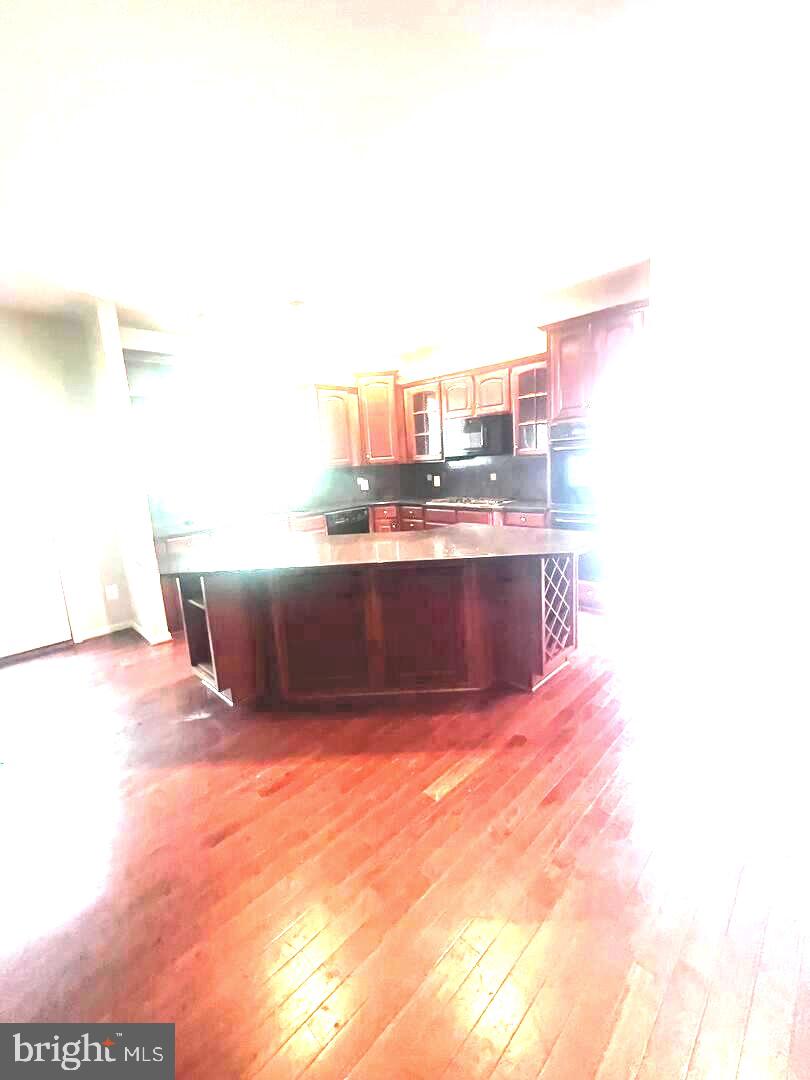 9315 RUSTIC BREEZE COURT