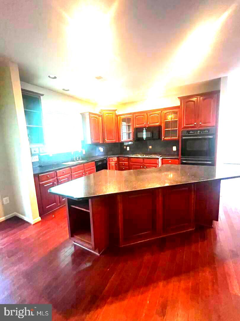 9315 RUSTIC BREEZE COURT