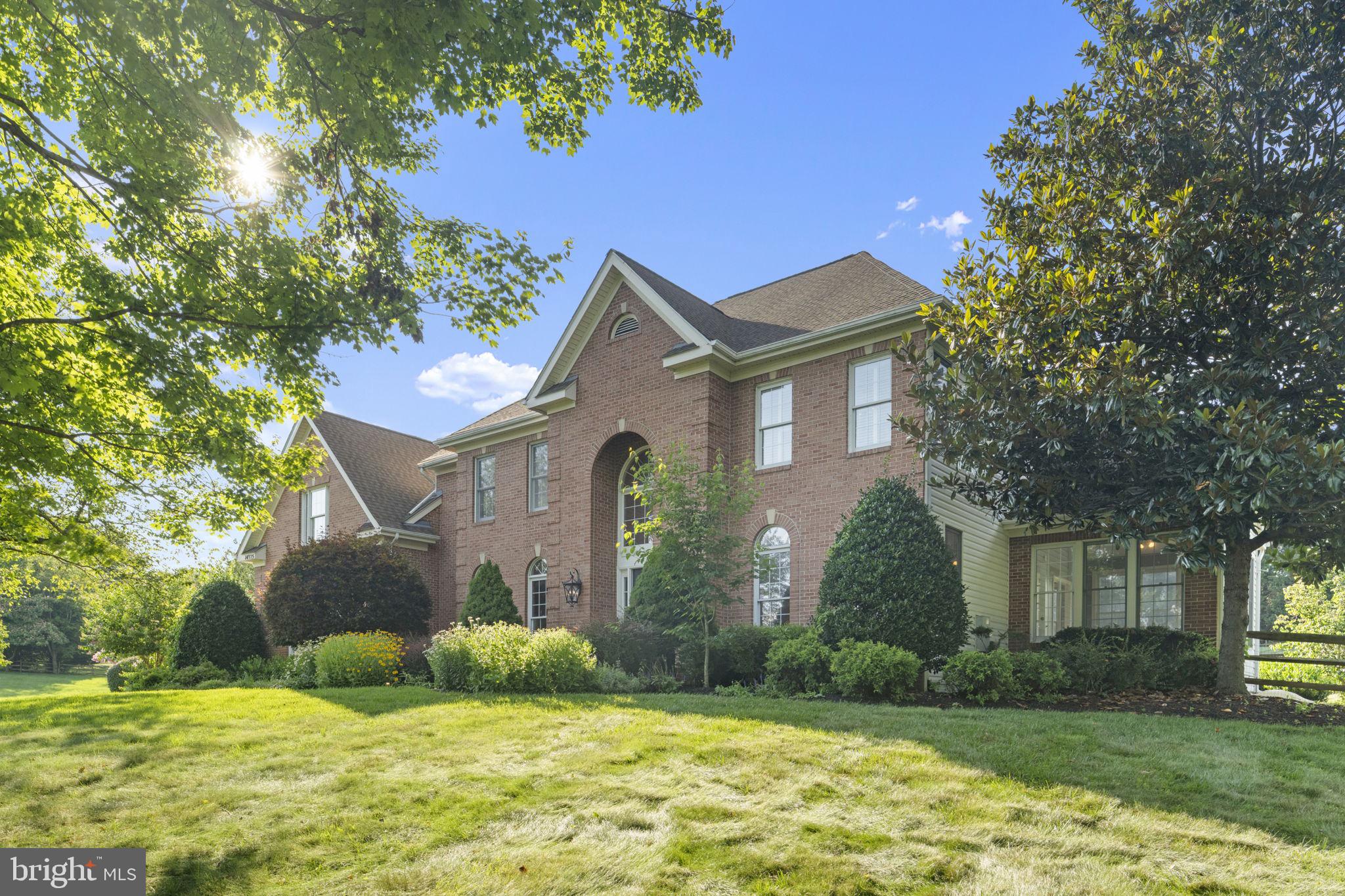 Welcome to 14925 Kelley Farm Drive—a rare, turnkey estate that has been completely transformed since 2020 into a modern sanctuary of style and substance. Set on over three private acres in Darnestown’s prestigious Spring Meadows community, this five-bedroom, four-and-a-half-bath Colonial offers 6,000 square feet of refined living space and an extensive list of upgrades that elevate both form and function.
Every corner of this home reflects thoughtful renovation and timeless design. The kitchen has been fully updated with sleek new quartz countertops, custom cabinetry, and a stylish beverage bar that anchors the main living space. The primary suite is a true retreat, featuring a completely reimagined design with two walk-in closets, a bathroom that includes a sprawling walk-in shower, and a freestanding soaking tub, inviting spa-like relaxation.
Step outside to a resort-inspired setting where you can enjoy over 3 acres to do whatever your heart desires, a newly added pool and deck (2020) create the perfect backdrop for summer gatherings or serene solitude. Practical enhancements abound, including a new roof, driveway, upgraded well pump and filtration system, and an irrigation system that maintains the lush grounds with ease.
This home is more than move-in ready—it’s an exceptional offering that blends luxury, comfort, and peace of mind in one of Montgomery County’s most desirable settings. The Spring Meadows neighborhood is an absolute gem, located minutes from the sought-after Darnestown Swim and Racquet Club.
List of some notable updates: Kitchen 2019, upstairs primary bathroom redesigned 2023, laundry room 2023, hardwood flooring 2022, new driveway 2024, roof 2019, whole home water system 2023, pool and deck created 2020, and much more!