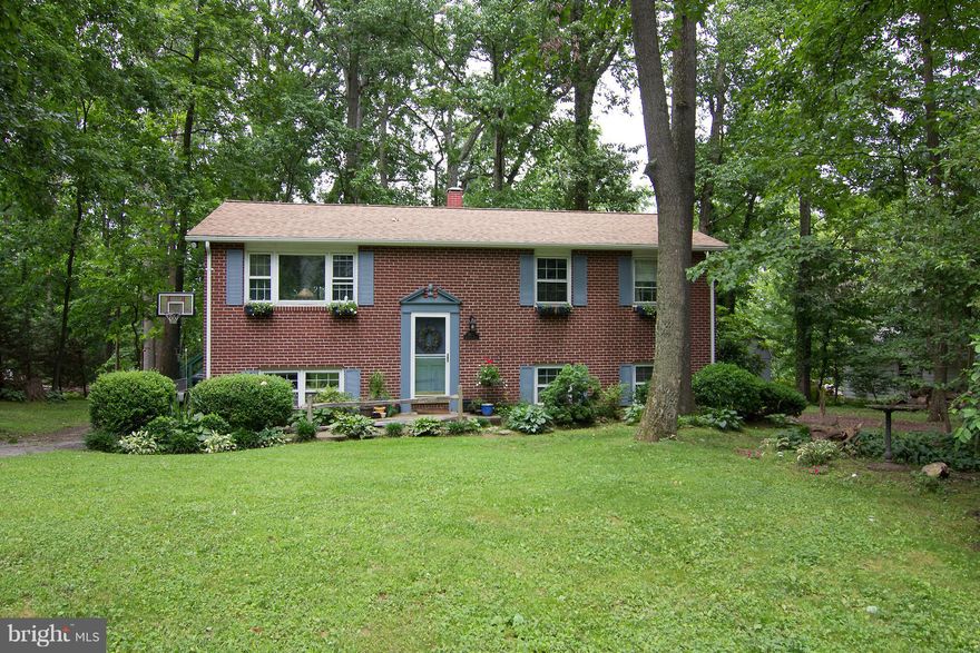 CRABS AND BEER NOT INCLUDED BUT WHAT A GREAT PLACE TO ENJOY THEM ON THE SCREENED IN BACK PORCH OVER LOOKING THE TREE STUDDED PRIVATE BACK YARD. BRAND NEW ROOF, GUTTERS AND HVAC. HARDWOOD FLOORS THROUGH OUT  OFF STREET PARKING  WOOD STOVE HEATS THE WHOLE HOUSE ** RECENT HOMES SOLD IN CARROLL COUNTY TRAILS AVERAGE DAYS ON MARKET ARE 4.**            NO HOA