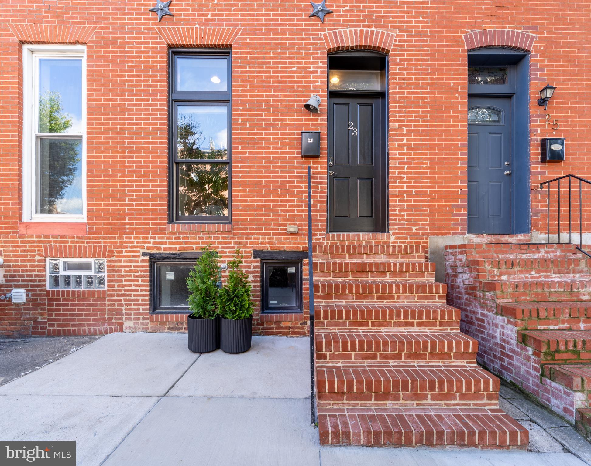 Butcher’s Hill Living: Spacious, modern and steps from it all!
Three car parking, renovated to CHAP standards in 2017, this home offers the perfect mix of historic charm and modern convenience, while still carrying valuable CHAP tax credits to ease your monthly payment. Whether you are already calling Baltimore home and ready to upgrade your lifestyle with more space, walk-in closets, private parking, and outdoor decks—or relocating to the city with Johns Hopkins just steps away—you’ll find a worry-free, stylish home in one of Baltimore’s most welcoming neighborhoods.
A home Designed for Living
Generous Lot: A rare oversized lot allows both off-street parking (three cars) and the creation of a private first-level garden or entertaining oasis.
Outdoor Lifestyle: Two decks provide incredible vantage points for city fireworks, evening dining, or entertaining friends. The third-floor deck is hall-accessible—no need to cut through a bedroom.
Third-Floor Suite: Your private retreat with a full bath, walk-in closet, and wet bar, complete with space for a beverage fridge. This level functions as a self-contained oasis for relaxing or hosting.
Walk-In Closets & Storage: Thoughtfully designed closets throughout (a true luxury in Baltimore rowhomes) plus a waterproofed basement with French drain—ideal for bikes, storage, or hobby space.
Upgrades for Peace of Mind: A brand-new sewer line and waterproofed lower level ensure low-maintenance living.
The lifestyle around you:
Johns Hopkins Medical Campus is just blocks away, making for an easy commute.
Fells Point waterfront is minutes away, home to boutiques, dining, and the Saturday morning Farmers Market.
Patterson Park is your backyard playground—dog walking, running trails, sports fields, festivals and concerts all year long.
Butcher’s Hill itself is known for its tight-knit, established community with tree-lined streets and a strong neighborhood association.
This isn’t just a house—it’s a lifestyle. Imagine mornings at the Fells Point Farmers Market, evening strolls through Patterson Park, and hosting friends on your private deck with fireworks in the distance. All in a home that’s been thoughtfully updated for comfort, storage, and ease.
Turnkey, tax-advantaged, and lifestyle-rich—this Butcher’s Hill home is the perfect landing spot for your Baltimore story.