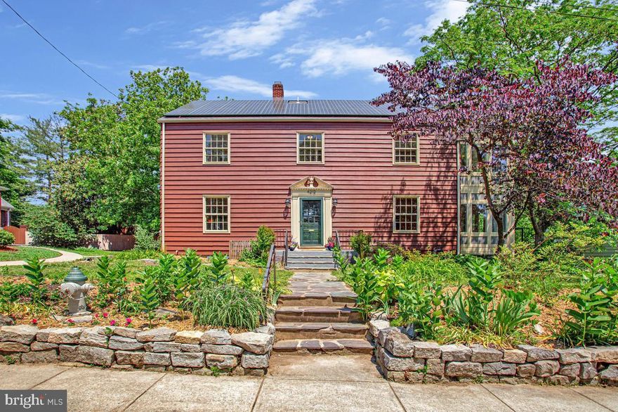 Gracious center-hall colonial, perfectly situated on a large, lush lot in hip, happening historic Hyattsville. Featuring freshly refinished oak floors, high ceilings, and classic architectural details throughout. This expansive property boasts 6+ bedrooms and 7 full baths with over 4300 sq feet of space  - an incredible opportunity to house a large family while already configured to have additional separate, income-producing apartments should you desire. 

The  15' x 31'  living room has 3 exposures, 9 foot ceilings, ornamental moldings, and a fireplace with a detailed mantel and wood stove. The main-level bedroom walks-out to the deck and rear yard through new Pella  sliding glass doors and has a classic black/white tile ensuite bath.  The kitchen is the heart of this home with beautiful hickory cabinets, Italian tile, stainless steel appliances, and a center island with a prep sink and gas cooktop, plus two wall ovens. I love the arched spice cabinet- useful and beautiful. The kitchen is open to a vaulted-ceilinged breakfast room with wood beams and arched windows and new Pella SGD doors. There's a beautiful view of the deck and lovely lot from this wonderful kitchen. The 15' x 16' formal dining room has a swing door to the kitchen and off the side is a Dutch door to a kitchenette and full bath with walk-in shower and a separate side entrance - this space can be a 1-BR apartment.

Upstairs the primary bedroom has two walk-in closets, an ensuite bath and pocket doors to a sitting room or a bedroom of its own.  The hall bath is connected to the back corner bedroom which has a big walk-in closet and lovely views of the rear yard.   The front bedroom has a large closet,  and much like the dining room, has a kitchenette and full bath attached and its own exterior entrance - this space can be a 1-BR apartment.

The top floor is a lovely suite. The bedroom has a charming built-in bed with storage and a skylight,  with pocket doors to the spacious dressing room, and shower bath. Plus there's a kitchenette and a family room with built-ins and skylights that opens out to a fabulous roof-top deck with views of the beautiful yard and neighborhood.  There's an exterior spiral staircase for additional egress.   

The basement is super useful and has a family room with the laundry area, plus a full bath used as a dog grooming area for this family.  The basement has a large cedar-lined closet for your winter wear and there's lots of room for storage and to tinker plus there's an exterior staircase that goes to the side yard. 
The property has radiator gas heat and central air, plus mini-splits in the addition - the best of both worlds - and Solar panels are owned outright!

There's plenty of room to plant and play on this .34 acre landscaped lot. The property backs to MacCaroy Alley and has 2 parking spots on the alley plus a long driveway off Longfellow Street too.  There's a cute and useful shed with a deck - great for garden supplies and bike storage. 

What a beautiful lot with native plantings and a food forest - many edible plants including pecans, figs, blueberries, blackberries, raspberries, service berry, hazelnut, American groundnut, elderberries, and multiple varieties of pawpaws - yum!

Super convenient location near Arts District shops & restaurants. Just over a mile to Hyattsville Crossing Metro Station as well as the Riverdale MARC Commuter rail station ( and farmers market!)  Easy access to parks and the Trolley Trail bike path.  What a great spot to land!