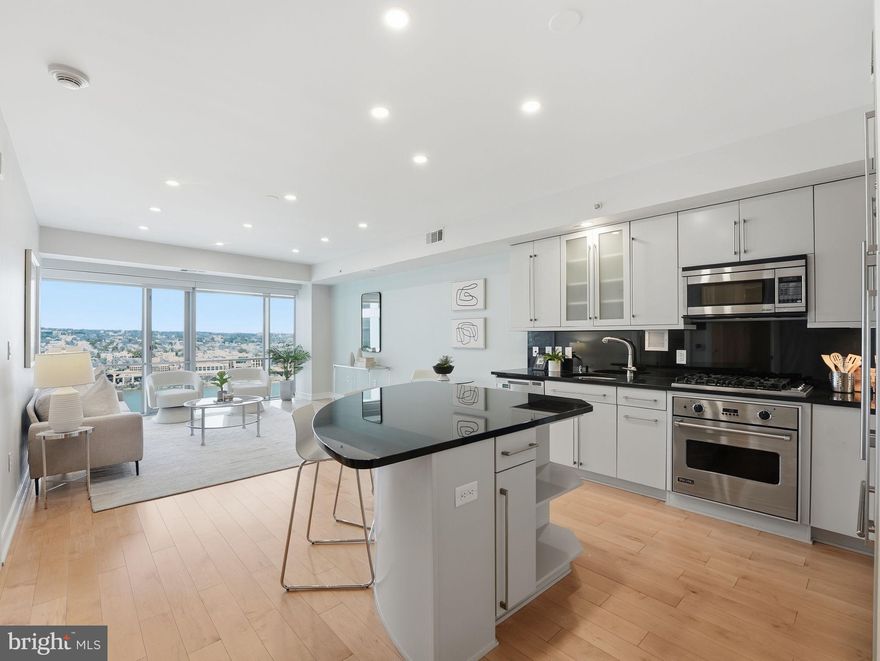 Walk into breathtaking views of the Potomac River from the 21st floor of The Waterview in Rosslyn. This 1 bedroom + den residence features floor-to-ceiling windows that fill the home with natural light and showcase dramatic river and Georgetown views.

The open kitchen includes a large island, granite countertops, and high-end appliances including SubZero, Viking, and Bosch. Hardwood floors run through the main living areas, creating a seamless space for everyday living and entertaining.

The den, located just off the foyer, is perfect for a home office. The spacious bedroom features floor-to-ceiling windows, generous closet space, and brand new carpet. Gas, heat, water, and sewer are included in the condo fee, leaving only electricity and internet as additional utilities.

The Waterview offers luxury, hotel-style living with a 24-hour concierge, fitness center, and a spectacular residents-only rooftop terrace with panoramic views of the Potomac River and Washington, DC monuments. Residents also have access to select services from the Le Méridien Hotel located in the building.

Located just steps from the Rosslyn Metro, Key Bridge, Georgetown, riverfront trails, restaurants, and shops, this condo offers a rare combination of luxury, convenience, and iconic views.