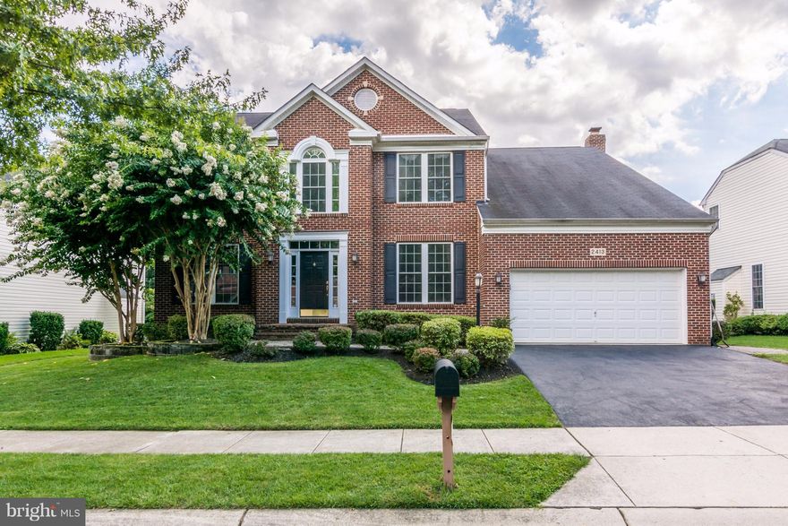 One of the largest brick front colonials in Crofton Valley. Main level features include library with cherry built ins, large open kitchen w/island, gas appliances, wine bar, granite counters & hardwood floors. Large Sunroom off of the kitchen and family room opening to stone patio. Basement features professional bar, theater room,wine cellar,workshop, and designer bathroom. Fenced yard with shed.