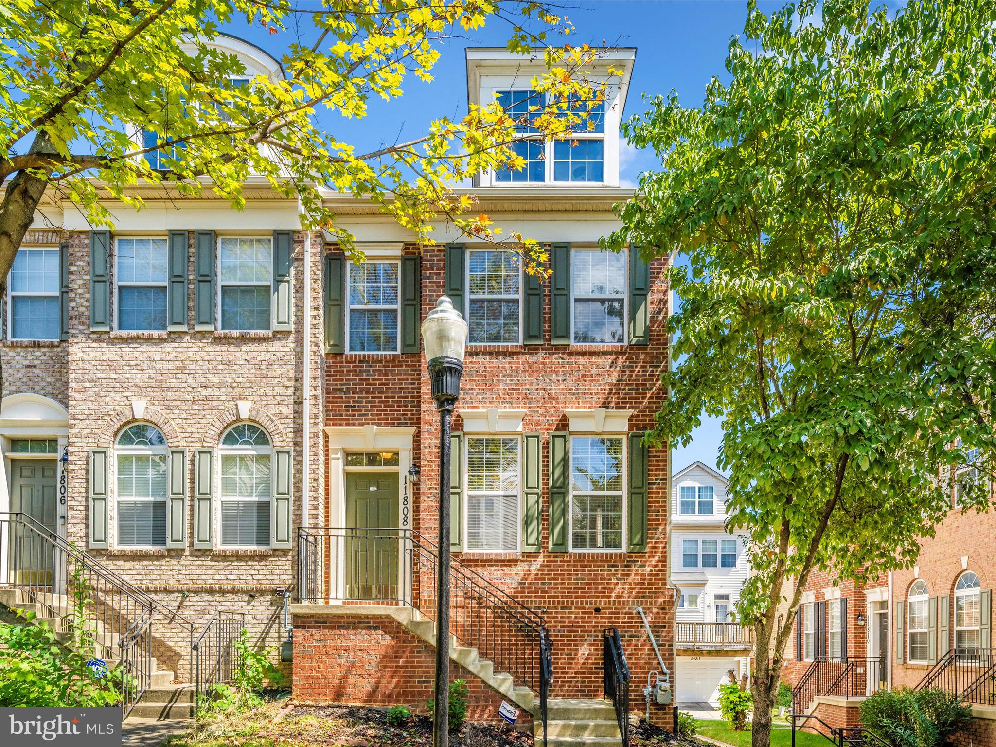 **This property is eligible for $25,000 towards down payment and/or closing costs, ask for details!** Welcome home to this meticulously maintained and spacious 4 level end unit home. This brick front beauty with a new roof (2024) is nestled in the heart of Eton Square is facing a courtyard for added ambiance and privacy. As you step inside, you'll notice the gleaming hardwood flooring and extensive crown molding throughout, as well as the natural light that pours in through the east, west and north facing windows. The main level offers a spacious foyer, formal living room and formal dining room. At the other end of the main level is the kitchen with granite counters, stainless steel appliances and a breakfast nook with a fireplace for cozy nights in and informal dining. Off the kitchen is the spacious rear deck with plenty of room for a grilling area, and seating around a firepit, just in time for fall leaves and roasting marshmallows. As you head upstairs, you'll find the spacious primary bedroom with dual closets, large primary bath with an oversized soaking tub, separate shower and dual sinks. Down the hallway you'll find a second bedroom with its own en suite bathroom. Upstairs to the 4th level, you'll find a large loft, perfect for a family room or play area, or even a potential bedroom. On the other side of the loft is a generously sized 3rd bedroom with a full bathroom. Downstairs to the first level of the home is another flex space that could be used as a gym, home office or movie room, a 4th full bathroom, the laundry room and access to the two car garage. Eton Square is conveniently located near major commuter routes 355, 270, 200, nearby MARC and Metro stations, endless shopping and dining options at several local shopping centers such as Milestone Shopping Center, Clarksburg Premium Outlets, Sakura, Wegmans, Crumbl, local hotels and attractions Black Hill Regional Park, Top Golf, just to name a few. Schedule your appointment to tour this large and versatile floor plan today!