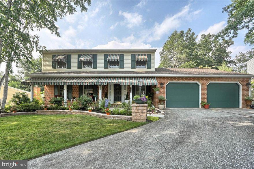 Pride of ownership is evident both inside and out in this wonderful four bedroom home.  You will love relaxing or entertaining on the huge 60' long composite deck and enjoying the wild life in your backyard.  This home boasts a remodeled kitchen with stainless steel appliances, quartz countertop, sink and tile backsplash.  You will find a spacious family room with fireplace and new patio doors in both family room and kitchen as well as wood flooring in the spacious living and dining rooms.  The first floor laundry/mud room with built ins as well as the powder room were recently remodeled.  Upstairs you will find four specious bedroom with two full bathrooms.  The lower level has approximately 900 square feet of finished living space which consists of a huge family room, office and play room as well as an unfinished workshop/storage area.  The roof was replaced in 2011 and the heat pump in 2007.  See seller's property disclosure for all updates too numerous to mention.  Oversized two car garage.  Fantastic full front porch where you can enjoy your morning coffee.  Extensive hardscape and beautiful landscaping.  You will enjoy the private picturesque backyard and views of the wildlife.  Conveniently located to highways and shopping.  Take a look, you will not be disappointed!