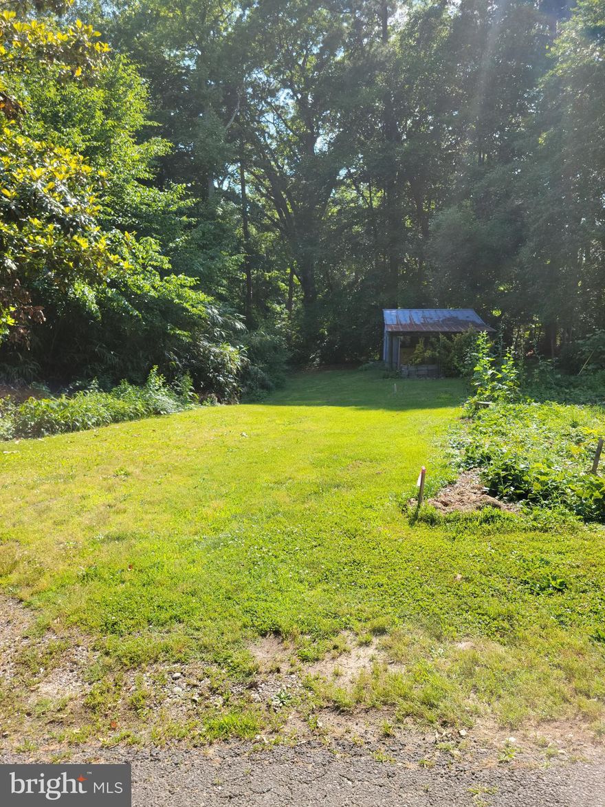 Lovely lot in Gunston Manor! 18,000 sq feet! Electricity and water to the property! Perc'ed in 2022 for 3 bedroom! Across the road from the Potomac River! Boat ramp close by!