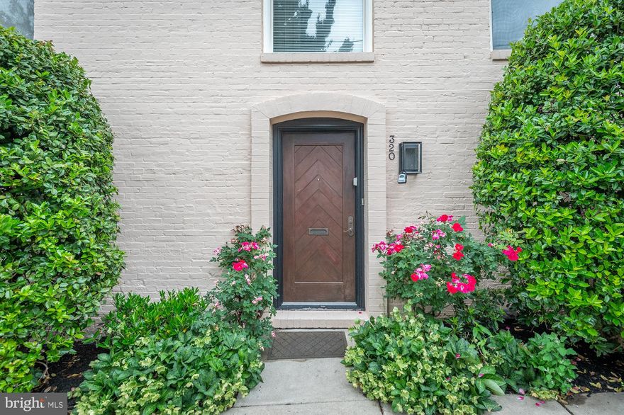 Charming inside and out best describes this Federal Hill property.  The front entrance exudes curb appeal from the flowering rose bushes to the herringbone pattern entrance door.  The 2-story foyer features exposed painted brick, uplight and soaring ceilings.  Upstairs you will enjoy the sun filled living room compete with wood flooring and painted exposed brick vaulted ceilings.  The open floor plan allows for living/dining flow perfect for entertaining guests.  The dining room has a built in buffet for displaying special pieces.  The kitchen is well appointed with ample cabinetry, counter space, and space for an eat-in table.  The primary bedroom is spacious with a large mirrored closet.  The ensuite bathroom features an oversized vanity and stand along shower.  The second bedroom has an ensuite bathroom or possible second primary suite.  The den features a cozy fireplace and the perfect location to unwind from the day.  In unit laundry with additional storage.  Enjoy garage parking for 2 vehicles.  Just steps away to the Baltimore-Waterfront Promenade, Federal Hill Park, American Visionary Museum, & the Inner Harbor.  Enjoy all that Baltimore has to offer and be in the center of it all!