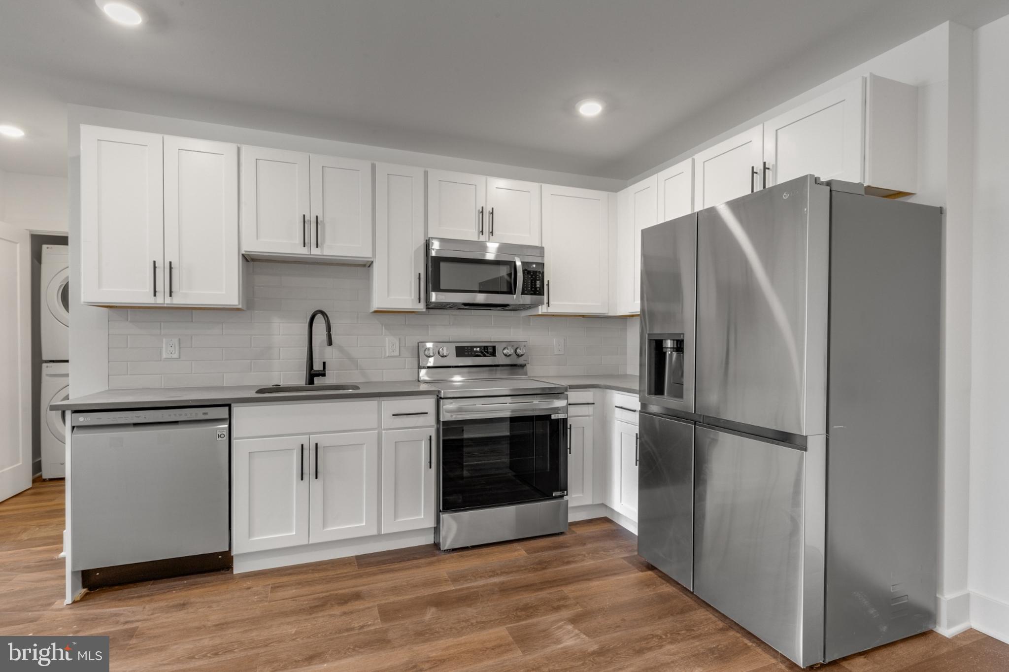 Available NOW | Leasing Special: 1 month FREE on a 13-month lease! Gross rent is $1,475/month - listed rent of $1,361/month reflects leasing special.
Step into a world of modern luxury with these beautifully designed units, tailored to enhance your well-being. Bathed in natural sunlight, each open floor plan showcases sleek finishes and thoughtful details. Unit #205 is a 1 bedroom, 1 bathroom apartment located on the second floor. The ductless mini-split A/C ensures year-round comfort, while the convenience of in-unit laundry adds ease to your daily routine. Gleaming hardwood floors and recessed lighting flow throughout, creating an inviting atmosphere. The gourmet kitchen, featuring stainless steel appliances and abundant cabinetry, is perfect for culinary adventures. Spacious bedrooms offer a peaceful retreat, complete with ample closet space and sliding doors. Pamper yourself in the luxurious ensuite bathrooms, with stylish tiling, lighted vanities, and sleek bathtub-shower combos. This professionally managed building is ready to welcome you home—don't miss this opportunity! Please note: Photos & video tour may be from a similar unit; exact layouts and finishes may vary. Leasing special details: Tenant to receive a credit upon move-in to use how they choose during the lease term. Listed rent reflects leasing special. Leasing specials are for new residents only.
Lease Terms:
Generally, 1st month, 12th month, and 1 month security deposit due at, or prior to, lease signing. Other terms may be required by Landlord. $55 application fee per applicant. Pets are conditional on owner's approval and may require an additional fee, if accepted. (Generally, $500/dog and $250/cat). Tenants responsible for: electricity, cable/internet, and a flat water fee ($35 for 1 bed & $55 for 2 bed). Assigned off-street parking is available for an additional $295/month. Landlord Requirements: Applicants to make 3x the monthly rent in verifiable net income, credit history to be considered (i.e. no active collections), no evictions within the past 4 years, and must have a verifiable rental history with on-time rental payments. Exceptions to this criteria may exist under the law and will be considered.