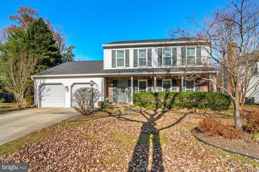Open House - Saturday, Dec 20th, 11-1 pm & Sunday, Dec 21st, 12-2 pm!! Elegant Colonial living in the highly sought-after Riva Trace community. From the moment you arrive, this home impresses with exceptional curb appeal and a welcoming front porch—an inviting place to sit back and enjoy your morning coffee while taking in the peaceful surroundings. Inside, the home offers 5 bedrooms, 3.5 bathrooms, and over 3,100 total square feet of thoughtfully designed living space (the tax record is incorrect, and doesn't include the bump out). A gracious foyer welcomes you into the home, with a refined sitting room to the right, that connects to a spacious main level bedroom. Straight ahead, a conveniently located full bath enhances main-level livability. The spacious kitchen, appointed with stainless steel appliances and ample cabinetry, flows effortlessly into the sun-filled dining room, where large windows bathe the space in natural light. Off to the left, the inviting family room features a cozy gas fireplace and sliding glass doors that open to a large Trex deck overlooking the backyard—creating a seamless indoor-outdoor connection perfect for entertaining or unwinding. Upstairs, three generously sized bedrooms provide comfortable accommodations, including a luxurious primary suite with a dedicated vanity, a walk-in closet, and a beautifully appointed en-suite bath. Two additional spacious bedrooms share a well-designed full hall bath. The finished lower level extends the living space with a recreation area, an additional bedroom, and a half bath—ideal for guests or multi-generational living—along with a large storage and laundry area. A two-car garage completes this exceptional offering. Set within Riva Trace, one of Annapolis’ most desirable waterfront communities, residents enjoy water privileges on Beards Creek and the South River, scenic walking trails, tennis courts, and playgrounds—all just minutes from historic downtown Annapolis, shopping, dining, and commuter routes.