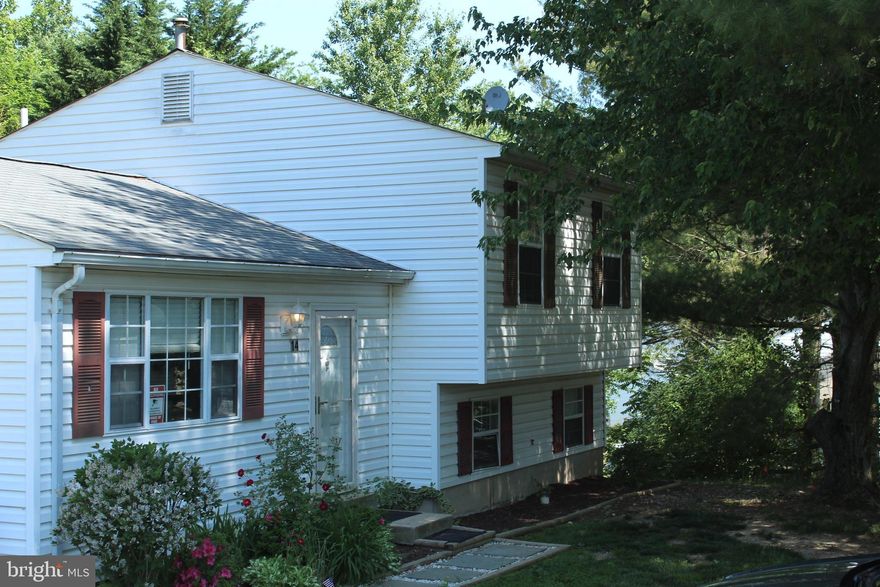 This 3 bedroom,  2 full bath , sunlit, split level home is  located in a cul-de-sac with a great rear yard and deck for entertaining.  The home was updated with new carpet, fresh paint, updated kitchen and baths in 2019.  It features a spacious living room, and a finished basement with a family room, full bath, and utility room with extra storage.   Conveniently located close to major commuter routes, restaurants,  and shopping.