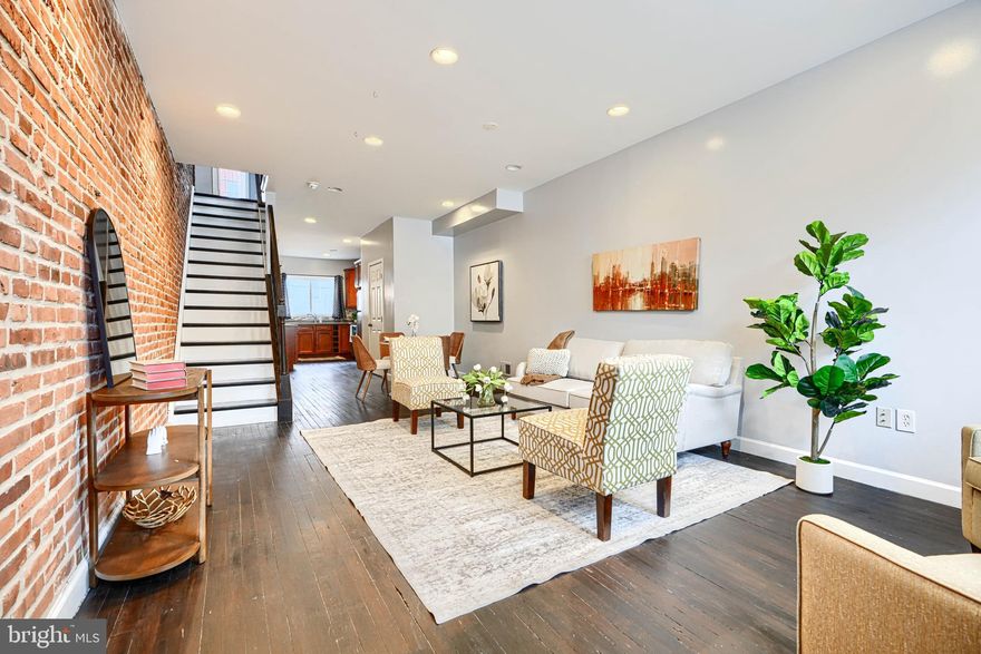 Located just two blocks from lovely Patterson Park, this turnkey two-bedroom, one-and-a-half-bathroom home is everything you are looking for in 21224 without the hefty price tag!   The first floor features an open-concept layout with ample dining space, a large kitchen, storage, and the coveted first-floor powder room.  Upstairs, you will enjoy two large bedrooms, a convenient laundry off the front bedroom, and an oversized bathroom with dual vanities, a shower, and a soaking tub. The rear bedroom is equipped with a private balcony for sipping your morning coffee or enjoying an evening cocktail.  The icing on the cake is your personal parking pad in the rear and tons of storage in the basement.  All of this  with easy commuter access to 95, 895, and 83, proximity to JHU, and a quick walk to Canton proper.