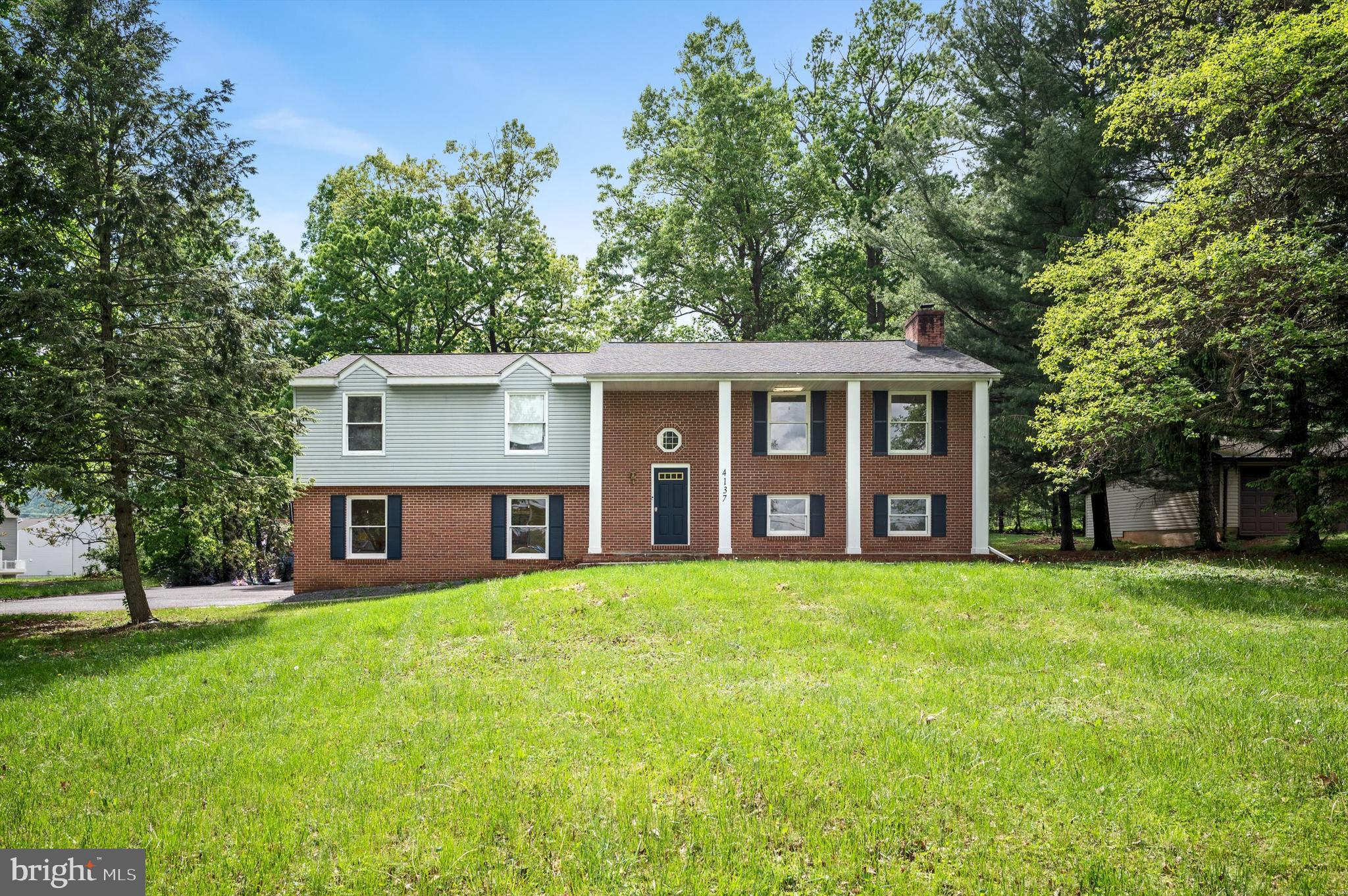 This large split-level multi-use building, currently operating as a daycare, is situated on approximately 1.5 acres set back nicely from Route 9. The upstairs boasts a generous living area with a fireplace, a large kitchen, and a separate dining space that leads to an upper deck with stairs down to the fenced-in backyard. There are three bedrooms on this level, along with two additional full bathrooms. The lower level features three bonus rooms, a spacious recreation area with a ground-level walkout, and a full bathroom. This prime location offers easy access to Interstate 81 and is conveniently located across the street from various shops and restaurants. This property presents a great opportunity for business, residence, or a combination of both!