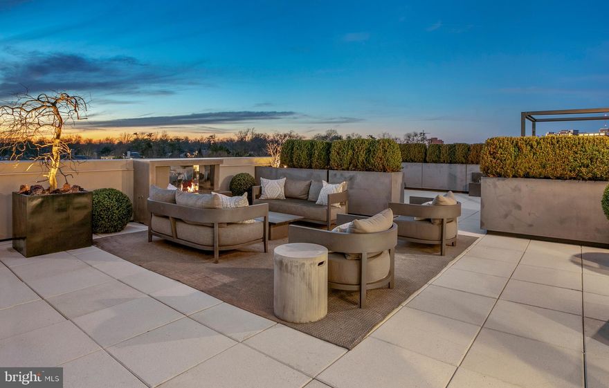 Custom renovated penthouse by acclaimed designer Mary Douglas Drysdale. An open floor plan is framed with walls of glass and flooded with natural light. Elegant, custom amenities abound throughout the 2800 square feet of interior space. An additional 1500+ SF of outdoor living space accessed from three different rooms offers total privacy, panoramic vistas, water feature, outdoor grilling and dining areas, private dog run and an abundance of greenery. This outstanding property features bespoke details at every turn - from extensive built in, custom cabinetry and paneling to elegant recessed lighting and fixtures, hardware, wide plank flooring and custom window treatments. The gourmet kitchen offers dual islands, paneled appliances and access to an outdoor dining terrace. An owner's suite with separate private baths, sitting area and dual walk in closets and private balcony rivals a five star hotel. The secondary bedroom includes a built-in Murphy-style bed, allowing the room to double as an office or den. This extraordinary residence also features extensive storage, laundry facilities, wine storage and a powder room.

Located just blocks from Bethesda METRO, and all of the lively dining and retail options of downtown Bethesda, this is a one of a kind luxury opportunity that will appeal to the most sophisticated and discerning client.