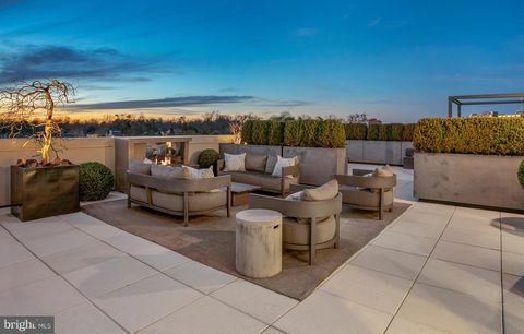 Photo of 4915 Hampden Lane #PH3, Bethesda, MD 20814 (MLS # MDMC2117826)