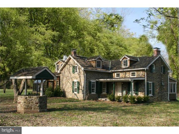 Turn into the driveway at Liberty Farm and you'll be pleasantly surprised at the long vista opening up before you: to the left, the pines cast a soft shadow across the drive; to the right, a pasture is bordered by forest, and in the middle of 14 acres a fine example of American architecture in Bucks County. Pristine in its original character, the house has a stone addition built by the current owner using fieldstones from the property, with deep window sills in the kitchen, wide-plank flooring and custom Shaker cabinetry housing gourmet appliances. A large screened porch overlooks the forest, and on the other side, a greenhouse-style room stays warm while you watch the snowfall cover the fields. The stone bank barn has its own well and stalls, making it perfect for horses if desired (close to Bucks Co. Horse Park). A separate workshop could be converted to a studio. Private on all 4 sides, easily accessible to New Hope, Doylestown, and the river villages along the Delaware, as well as only 90 min. from NYC.