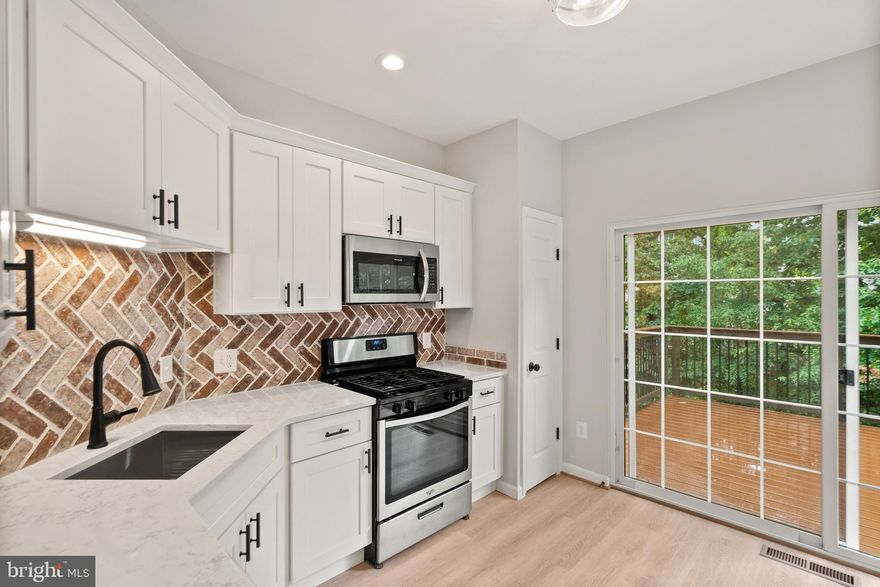 There’s nothing in the area that compares to the interior finishes of this stunning home!
A fully remodeled, turnkey townhome in the highly desirable Braemar community. This stunning 3-bedroom, 2.5-bath home has been completely updated from top to bottom, offering high-end finishes.
The heart of the home is the beautifully renovated gourmet kitchen, featuring brand-new quartz countertops, modern cabinetry, and an elegant backsplash. The spacious and open main level is ideal for entertaining, leading to a large Trex deck perfect for outdoor dining.
All bathrooms have been fully updated with new vanities, designer tile, and contemporary fixtures.  Enjoy durable and stylish luxury vinyl plank (LVP) flooring on every level, complemented by fresh, neutral paint.
Additional highlights include:
Brand-new roof (2024)
New HVAC system (2024)
Concrete patio beneath the deck for additional outdoor space
Fully painted garage with custom epoxy flooring and a new garage door
Small Dogs allowed
In the Braemar community, you’ll have access to resort-style amenities including pools, tennis courts, playgrounds, walking trails, and clubhouses. The location is unbeatable—minutes to VRE, major commuter routes, Gainesville shopping, 2 Silos Brewing Company, and Manassas Airport.