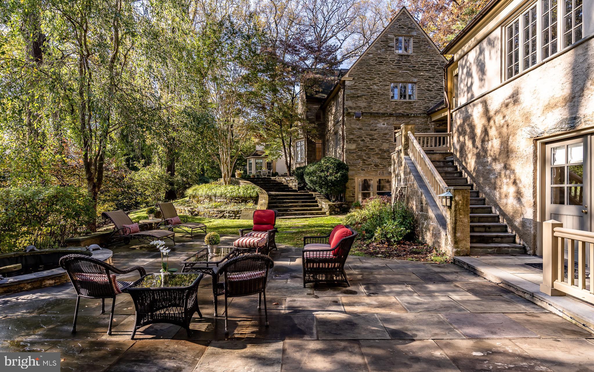 This gracious, extraordinary Walter Durham stone manor home is located at the end of a private cul-de-sac in Northside Haverford. The home, which was originally the cherished residence of members of the Evans family, has been meticulously maintained and thoughtfully updated and modernized by the current owners. The home is a short walk to the Merion Cricket Club, the Haverford train station and all of the shopping and dining that this prestigious area of Philadelphia's Main Line has to offer. The private grounds are an oasis with mature, manicured landscaping, and the interior of the home is washed in natural light and gorgeous views of the property, lush tree-tops and valley. The bright, freshly renovated gourmet chef's Kitchen is equipped with top of the line appliances, a large marble-topped island and ample prep and storage space. As you flow from formal to informal living and entertaining spaces on the main level you will enjoy the wall of windows, French Doors leading to a dramatic tiered flagstone patio with alfresco dining area and a butler's pantry with glass cabinets and a beverage refrigerator. These spacious indoor/outdoor areas are perfect for cozy gatherings or full-scale holiday and special event gatherings. This level is also graced with a cheerful bay window nook that is the perfect location for a grand piano or seating overlooking the outdoor living areas.Upstairs you will find a large, luxurious Master Suite with multiple custom closets, dressing room, laundry area and spa Bathroom. There are two additional spacious Bedrooms on this level, each with their own private Bathroom. The third level has two more Bedrooms, one currently used as an office, and another full Bathroom.The finished lower level that opens to the scenic landscape and patios has plenty of storage spaces as well as an additional laundry area. The private guest suite, perfect for in-laws or an Au pair, can be accessed via stairs from the Family Room or from the lower terrace. With the white marble Bathroom, double closets and independent heating and cooling controls, your guests will feel thoroughly pampered. Owning this elegant home in this prime location is a rare opportunity! And, it is priced to sell!**Detailed home features list and stucco inspection report are attached.**