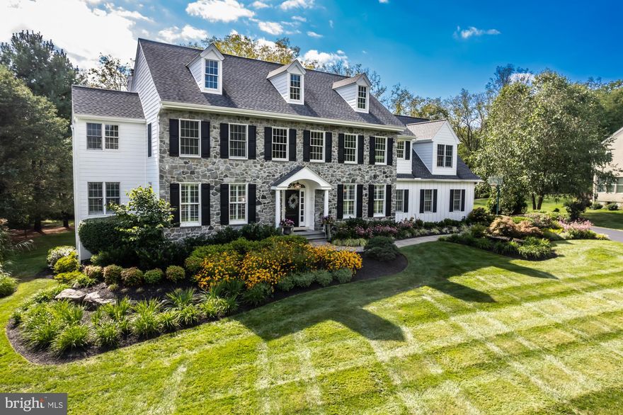 Step into the world of refined living with this exquisite 5-bedroom, 3 full and 2 half bath colonial residence, nestled on a private 1-acre lot. The centerpiece of this home is undoubtedly the newly updated gourmet kitchen. It's a chef's dream, featuring professional appliances including a Wolf Double Oven, Wolf range with commercial hood, Subzero refrigerator, additional beverage refrigerator, custom cabinetry and drawer inserts, power outlet tracks inline with undercabinet lighting, and stunning quartz countertops. Beautiful hardwood floors run throughout the main floor and an open concept design seamlessly connects the kitchen, eat-in area, and living room, complete with a vaulted ceiling. Behind the kitchen, you will find a mudroom and updated laundry room, with abundant storage and granite countertops. The main floor is completed by a large formal dining room, additional living room, and private office space with built in shelving. Multiple stairwells allow easy access to the second floor, where you will first find the master suite. It boasts a luxurious remodeled master bathroom with an elegant soaking tub, glass surround shower with bench seat, private water closet, and double sink vanity. Two walk-in closets ensure that you have ample space for all your belongings. Four additional spacious bedrooms complete this floor, two of which share a jack-and-jill bathroom, with a 3rd full bathroom serving the last two bedrooms. Descend to the fully finished basement, where you'll discover a world of possibilities. It features a half bathroom, a wet bar for entertaining, a private room at the rear that can serve as an office, home gym, or designated kid space, a cedar closet, and generous storage in the unfinished utility room, as well as numerous spacious closets and built-ins. The sprawling three-tier deck and patio offer plenty of space for entertainment, relaxation, and taking in the beauty of the serene backyard. From morning coffee to evening cocktails, this outdoor space is perfect for all occasions. Situated just up the road from 926 and 352, this home provides easy access to Route 3, Route 1, 202, and the West Chester Borough. Schedule your tour today!