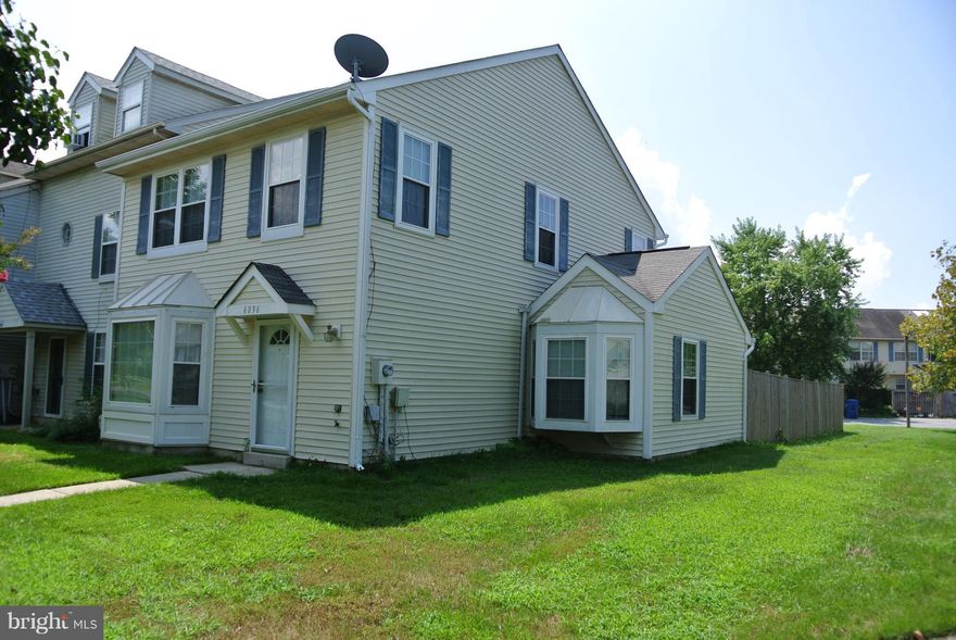 Lots of space in this end unit townhome. Move In Ready.  Huge Fenced Back Yard. Large Patio. Tastefully Decorated. Quick Settlement Possible.