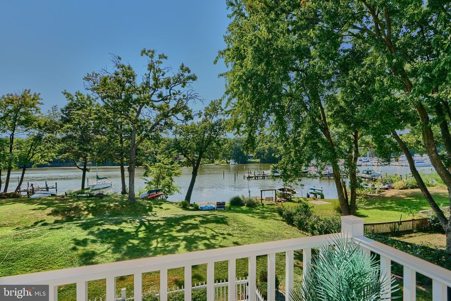 Gorgeous Rare Offering Of This End Unit River Front Townhouse in Middle River with a deeded boat slip.  This fully updated townhouse features 4 bedrooms and two full bathrooms as well as one half bathroom and a boat slip. The open floor plan main level invites you to glance straight through to the gleaming large rear sliders overlooking the new rear deck and expansive backyard.  The updated kitchen features granite countertops with a whole house beach theme.  Make your way upstairs to your primary bedroom that overlooks your river and backyard view and boosts plenty of closet space. Your fully finished lower level adds another level of full entertainment including a bedroom and full bathroom. Continue through the lower level to your very own three season room. Outside the private three season room is a garden oasis leading to the expansion long riverfront yard. This exclusive community offers a wonderful pier with a deeded boat slip. Three parking spaces are also included.