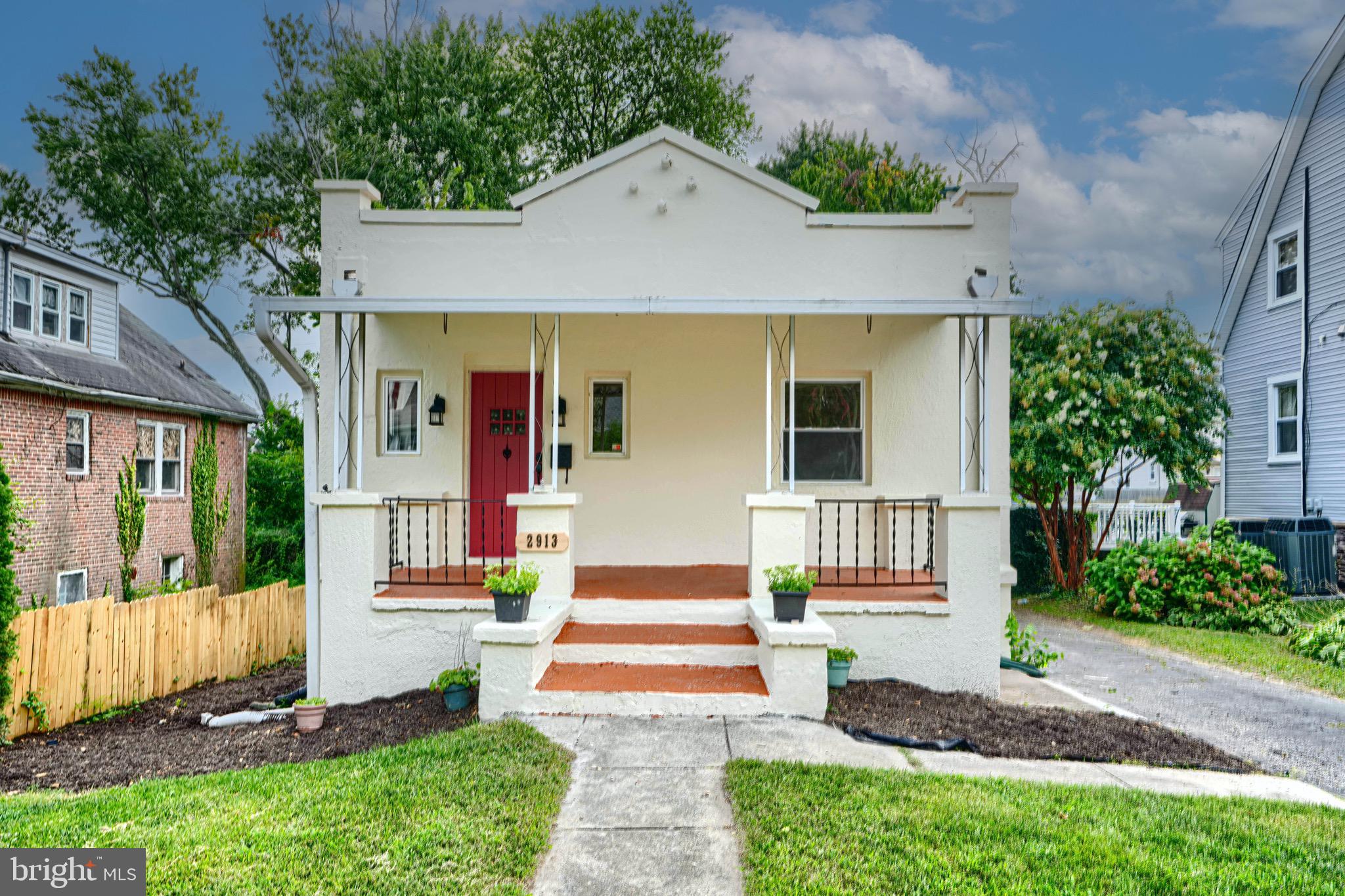 Don't miss the opportunity to explore this beautifully renovated historic home in Baltimore. This property boasts refinished hardwood floors, updated appliances, and two fully tiled bathrooms, along with a spacious finished basement and a generous backyard.
As you approach the home, you'll be captivated by its charming curb appeal and inviting front porch. Upon entering, you're welcomed by the elegant stained hardwood floors and the graceful archway that seamlessly connects the family room to the dining area. To one side, you'll find two spacious bedrooms bathed in natural light, accompanied by a full bath.
Continuing through the dining room, you'll arrive at the completely updated kitchen, featuring a butcher block countertop that perfectly complements the home's aesthetic. Adjacent to the kitchen is a versatile bonus bedroom, along with a door that leads to the backyard, ideal for outdoor dining and entertaining.
Descend into the expansive entertainment room below, which includes yet another bonus room that can serve as a bedroom or home office. A large bedroom with beautiful glass doors opens directly to the backyard, creating a serene connection to the outdoors. A full bathroom with a fully tiled shower is conveniently located near the entertainment area.
The backyard presents endless possibilities for customization—imagine a fire pit, a pool, or an expanded patio for outdoor gatherings. Come see this exceptional property today and envision the potential that awaits!