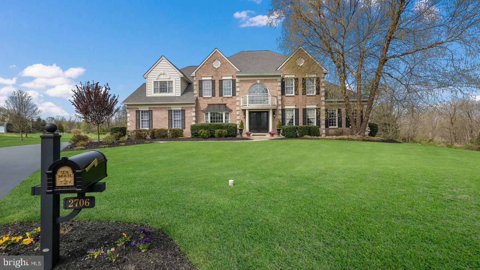 Welcome to the Estates at Dark Hollow! This spectacular brick home boasts over 5,000 square feet of living space on a quiet cul de sac, with a fabulous view and a professionally manicured lot. Greeting you as you enter, is the dramatic two-story foyer with beautiful marble floors, which adjoins the formal living and dining room filled with lots of natural sunlight & hardwood floors throughout. Through the French doors, enter the conservatory, filled with lots of windows and fabulous light, ideal for entertaining. The two-story family room offers a lovely marble gas fireplace which is surrounded by a wall of windows, recessed lighting & beautiful custom hardwood floors. The large gourmet kitchen is outfitted with an island with seating, granite counters and lots of cabinets space. The spacious breakfast area overlooks a large deck with calming views of the rear yard, perfect for enjoying your morning coffee or tea. Finishing the first floor with a private home office, butler’s pantry, powder room, large laundry room with a sink & coat closet. Head upstairs into an open landing area that overlooks the foyer and family room, there you will find four bedrooms and three full bathrooms! The owner’s suite is spacious and features an additional room, which is currently being used a seating area. The cathedral ceilings, two spacious walk-in closets and a third closet for extra storage create a practical and luxurious space. The owner’s suite bathroom features a dual vanity, soaking tub, vaulted ceilings, skylight, and a standing glass shower. Bedroom two is a princess suite with a full private bath and walk-in closet, two additional bedrooms sharing the hall bath, complete the second floor. Looking for more living space? The finished lower level with high ceilings, recessed lighting, and an exercise area add to the unique features of this home, with amazing space for storage, or future finishing. The walk out lower level provides easy access to the backyard, where you can use your imagination to create the outdoor living space of your dreams! Additional amenities include a 3-car garage and dual zone heating/cooling. Award winning Central Bucks School District – book your appointment today!