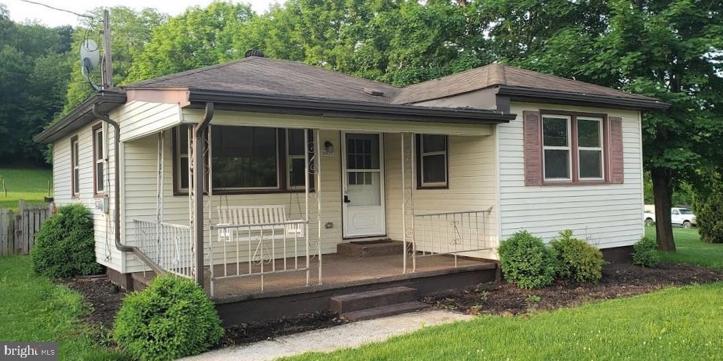 2 bedroom 1 bath ranch on .72 acres about 6 miles from downtown Lewistown. This home features a large carport, coal stove & partially fenced backyard. Swing on the covered front porch and enjoy the valley views!