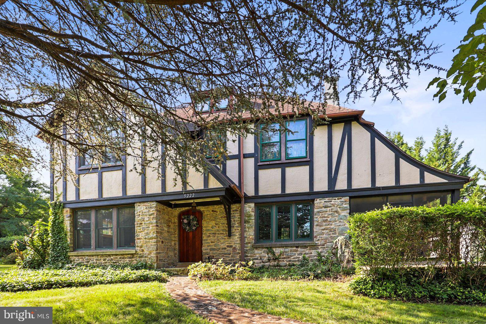 This home is straight from the pages of your favorite storybook. Mountain stones, exposed beams, hardwood floors, a picture window complete with a padded built-in bench to read the day away, and so much natural light are all here at 5222 Rockery Road. The original wooden door proudly boasts a stained glass piece of perfection as you walk into the front entrance and are met with a large and well-designed interior. The first floor has a fireplace, screened in porch, formal dining room, kitchen, and half bath. The second floor houses 3 of the 4 bedrooms, the full bath, and a large closet that could even be turned into your at-home office. The third floor houses the 4th bedroom complete with a cedar-lined closet. The current owner used this room as a play space but the possibilities for this floor are many! The partially finished basement is where you can find additional living space, laundry, and a large storage area. The detached garage is fully electric and was previously used as a wellness area complete with tanning facilities. Now, the garage can be used to shelter your vehicle, be finished for a studio guest living space, or even be used as an art studio, wood working shop, or office space. The well manicured, private lot backs up to a farm. Spend evenings at your fire pit basking in the joy that this dreamy home is yours! Come see it today - this home will not last long! For those who love history: this home was built for the original General Manager of the Glatfelter Papermill.