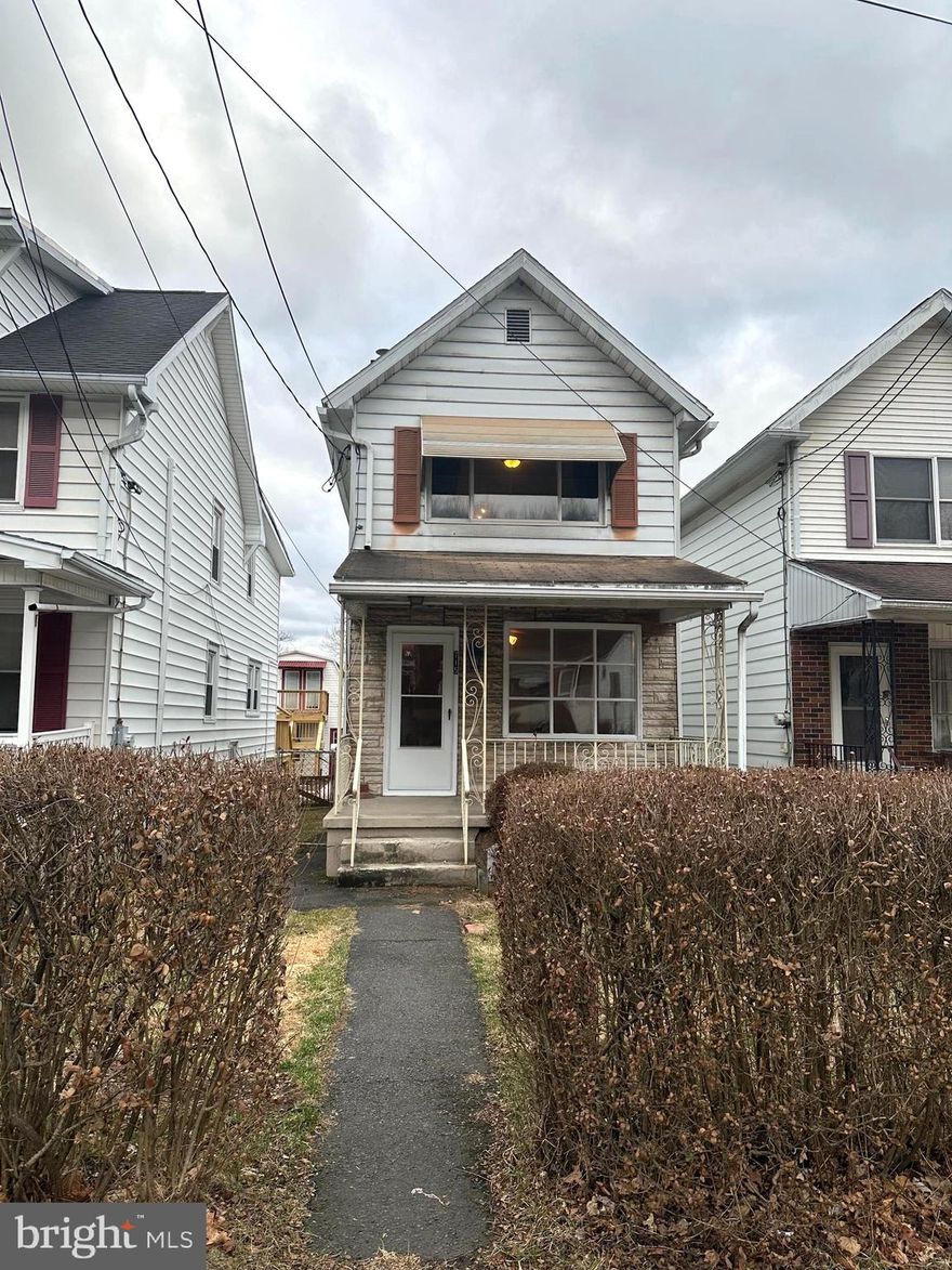 Home has been in the same Family for 92 years.  Built by the Railroad, this single home has good bone; plus, a fenced in yard and an oversized garage.  The kitchen has all stainless steel appliances, oversized stainless steel sink with glass backsplash tiles. The view from the kitchen window is of the large deck, fenced in yard and the garage.  This well care for home is great for a startup family or downsizing with a comfortable living room and dining room.  The second floor has a very large primary bedroom with a large lighted closet. The bathroom has been updated.  The second bedroom is carpeted and a comfort size with a view of the backyard.   Basement is partially finished with a laundry room and two additional rooms.  200 AMP electrical service  installed in 2010 and heating system installed in 2013.  This single home with a fenced in yard and garage won't last long.  Come to the Open House on Saturday, March 22, 2025, and see for yourself.  Very motivated Seller.
