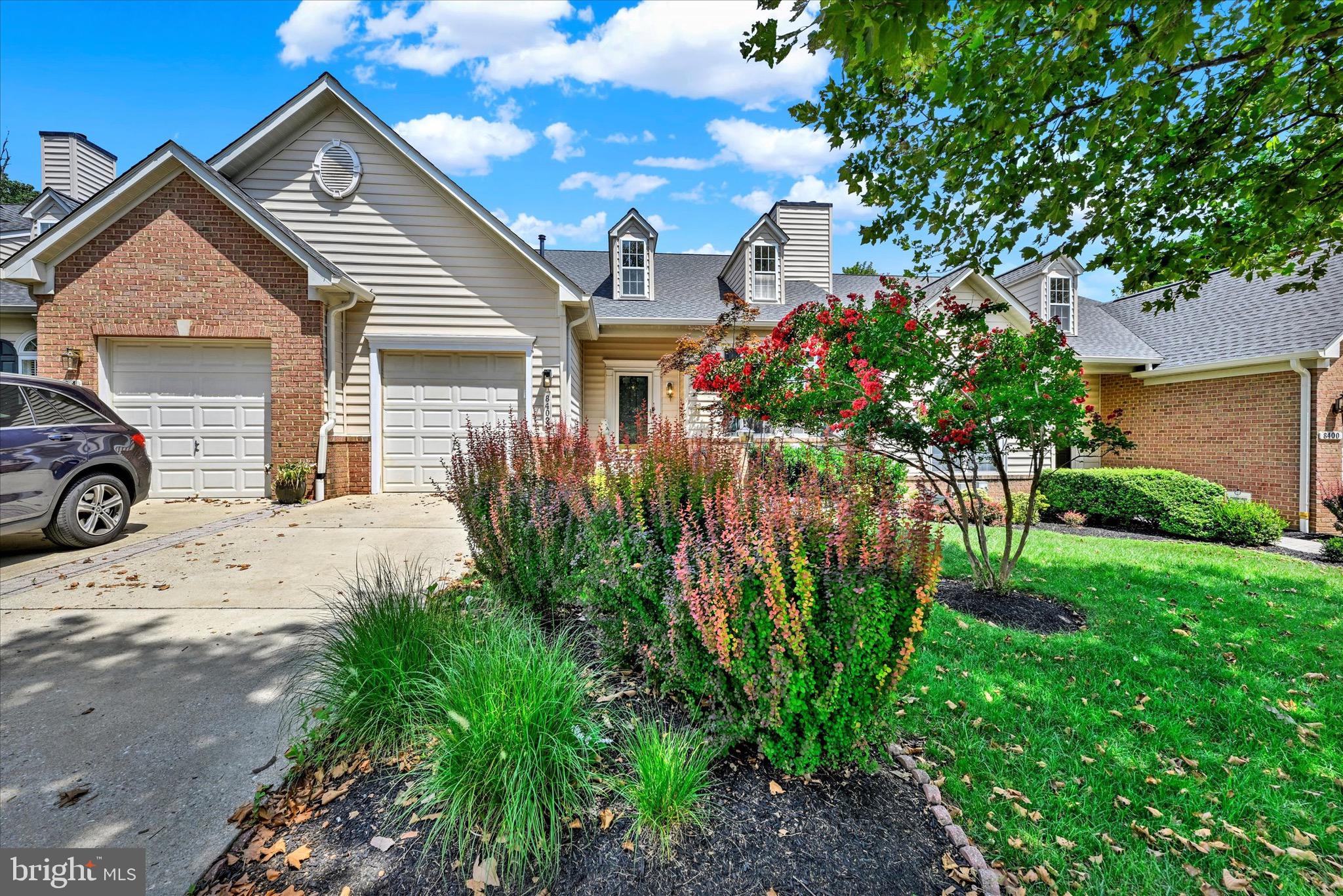 Welcome to effortless living in the gated 55+ community of The Villages at Woodholme! This spacious 3,800 SF home checks every box for active adults who want room to host without the hassle of upkeep. Enjoy true main-level living with everything you need on one floor plus plenty of space for guests upstairs and on the finished lower level with walk-out to a charming paver patio. Your new lifestyle includes low-maintenance perks like lawn care, snow removal to your front door, and access to premium amenities: pickleball, tennis, pool, fitness center, clubhouse, and more. You’re minutes from Wegmans, Trader Joe’s, and Foundry Row’s dining and shopping. Whether you’re relaxing on the deck, enjoying community events, or welcoming visitors, this home offers comfort, security, and connection. Welcome home to 8402 Prairie Rose where you aren't just downsizing. You are upgrading your lifestyle.