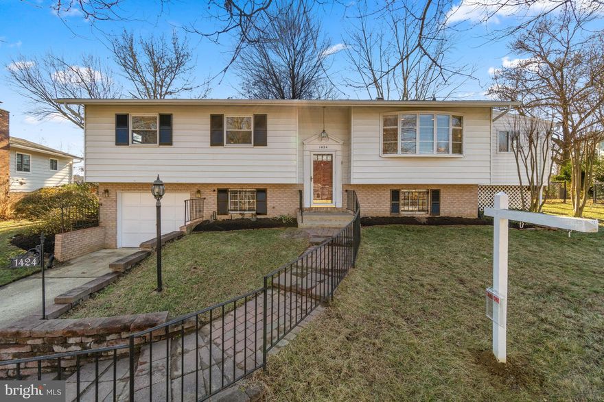 Welcome to the desirable Annapolis community of Heritage. On the main level the hardwood floors lead you to 3 bedrooms, combo living/dining and a large eat-in kitchen. The primary bedroom has a spacious closet and ensuite bath with updated shower. The laundry room is also located on the main floor with three windows, rear exit door to the deck, and plenty of space for a mudroom. Downstairs there is a large additional living area and a fireplace with a gas insert, an office/guest/craft room, a full bathroom, and garage access. The garage is spacious with plenty of space for storage or equipment.  The home has lots of natural light, plenty of closet and storage space and is only a block from the community pool. Updates include New Roof (2020), a sizable re-boarded deck (2021) that overlooks the large private wooded back yard, most windows replaced (2016), and Heater system (2020). With easy access to route 50, 97, 2, 301 and downtown Annapolis, this is a commuter's dream house. The new Annapolis Library, along with playgrounds, shopping, and restaurants are within walking and biking distance.