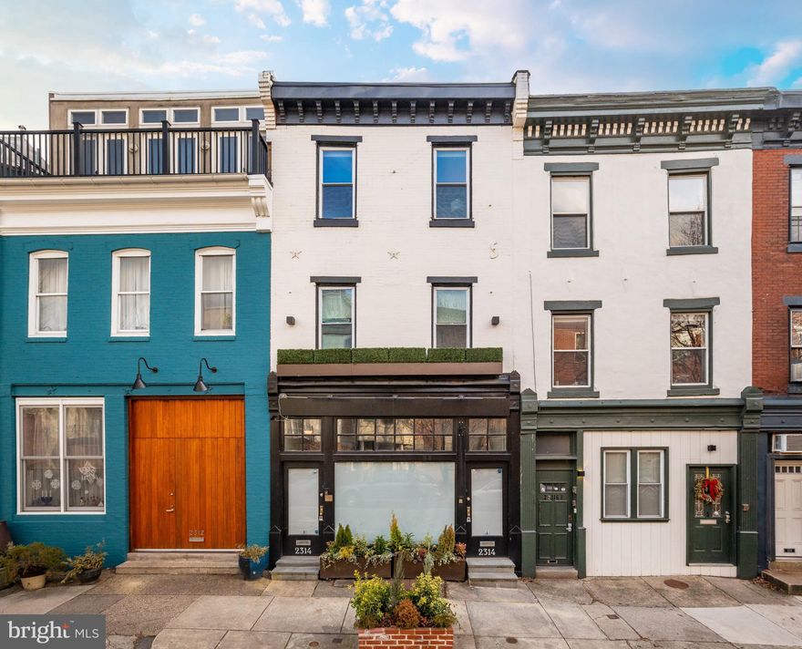 Live-work-play in one of Philly's most dynamic settings: the intersection of Fitler Square and Graduate Hospital. Located in the Greenfield School catchment (Blue-Ribbon elementary schooling) and just up the block from The Philadelphia School (TPS) and multiple Goddard School locations, this bespoke residence was gut renovated in 2018 to create a family-friendly living environment. The property boasts 3bd x 2.5ba across ±2600 SF with a full unfinished basement for storage. Handpicked designer interiors coupled with a distinctive floorplan, multiple outdoor spaces and a prominent address make 2314 South irreplaceable real estate. The top floor features a magazine-worthy, deluxe gourmet kitchen with timeless selections and materials which flows right into the spacious living room with a fireplace and dazzling skyline views. A custom banquette for dining and a rear deck for outdoor dining/entertaining complete this level. The oversized primary suite on the 2nd floor features a full frame glass shower with rainhead, custom double vanity, walk-in closet and fireplace. A rear bedroom is adjacent to the 2nd floor hall bathroom with mosaic tile, tub/shower combination and LED mirror above a marble top vanity. An oversized in-law suite on the ground floor rear (or 3rd bedroom alternatively) features an urban garden/putting green.  2314 South features a true ±600 SF home office — ideal for the "work from home" lifestyle — with its own private entrance PLUS a kitchenette and powder room on the ground floor. The home office connects via doorway to the in-law suite, where a custom secret staircase was built to access the in-law suite without having to pass through the office. The entire first floor can be open flow, or contained into two spaces, depending on preference. The laundry room with full washer/dryer and quartz folding counter is located at the base of the secret stair between the office/in-law suite. Walkable to some of the city's best "soon-to-be" Michelin-star-rated and James Beard-nominated/winning restaurants, parks and urban amenities, this supreme cosmopolitan location provides easy access to all major avenues and expressways in the region, as well as Amtrak's 30th Street Station — just across the river. Two supermarkets are located within one block, in addition to multiple boutique cafes and neighborhood-favorite local restaurants.  CHOP, PENN, HUP, DREXEL are just a short stroll over the South Street Bridge. CHOP is in the midst of completing their 2nd world-class medical research tower just 3 blocks west. Center City AND University City are right at your doorstep from this location. Hear the crowds from Franklin Field from 2314 South Street during the famous Penn Relays and fall football games @ UPENN. Stroll into Rittenhouse Square for the best high street shopping and gourmet dining on the east coast. Access the Schuylkill River Trail (rated USA's best) in minutes for cycling, walking and running. Dog parks, pocket parks, and all of the urban conveniences of this Top-10 USA MSA are easily accessible from 2314 South Street. Ample street parking is available in the neighborhood for residents. Amazon is on the corner— never miss a package! Wawa, Starbucks, CVS, Rita's, South Square Market, Heirloom by Giant (and more) are all within 2 blocks in this amenity-rich neighborhood. Available immediately in one of the most high-demand locations in Philadelphia, where limited inventory for turnkey luxury homes exists.